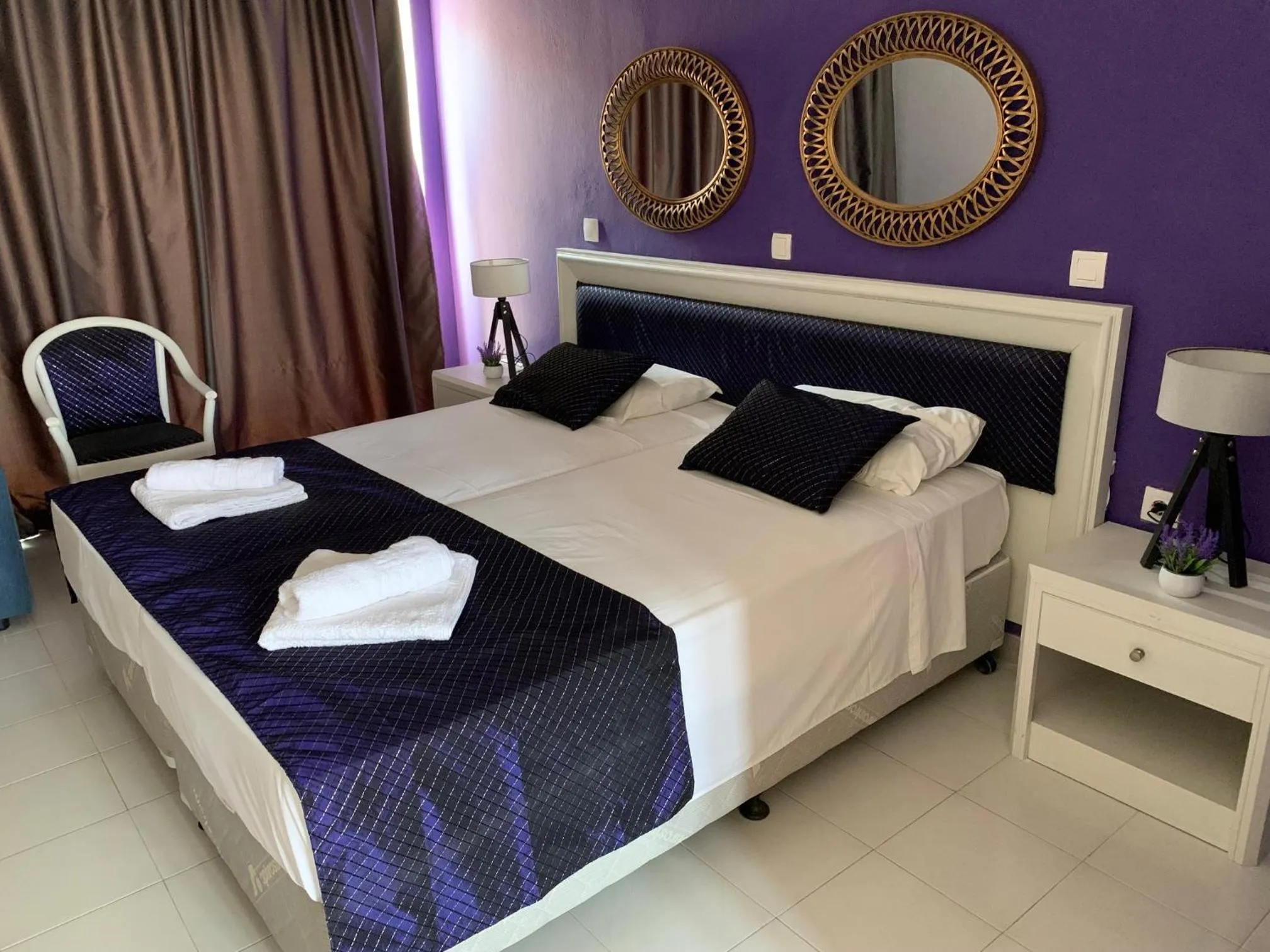 Bed in Alkyonides Boutique Hotel
