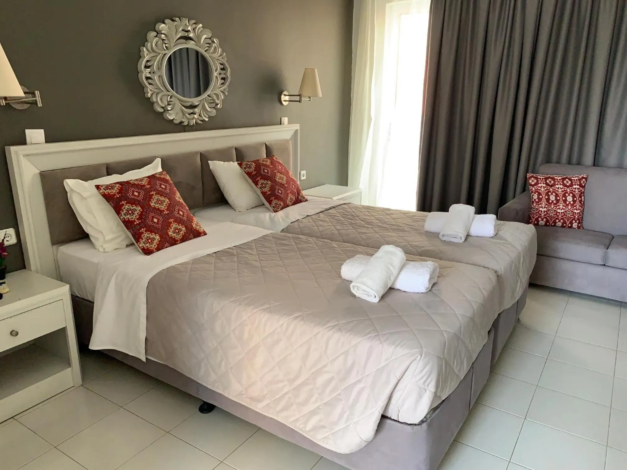 Bed in Alkyonides Boutique Hotel