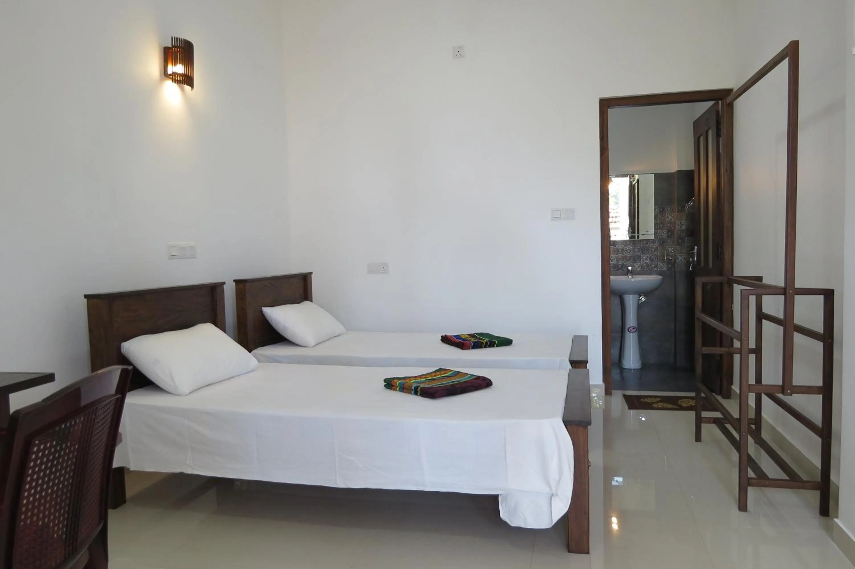 Photo of the whole room, Bed in Sailors Mirissa