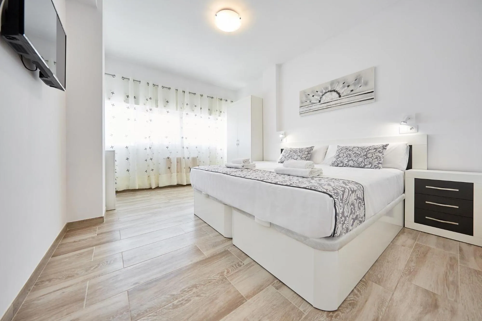 Bed in Sonrisa Apartments