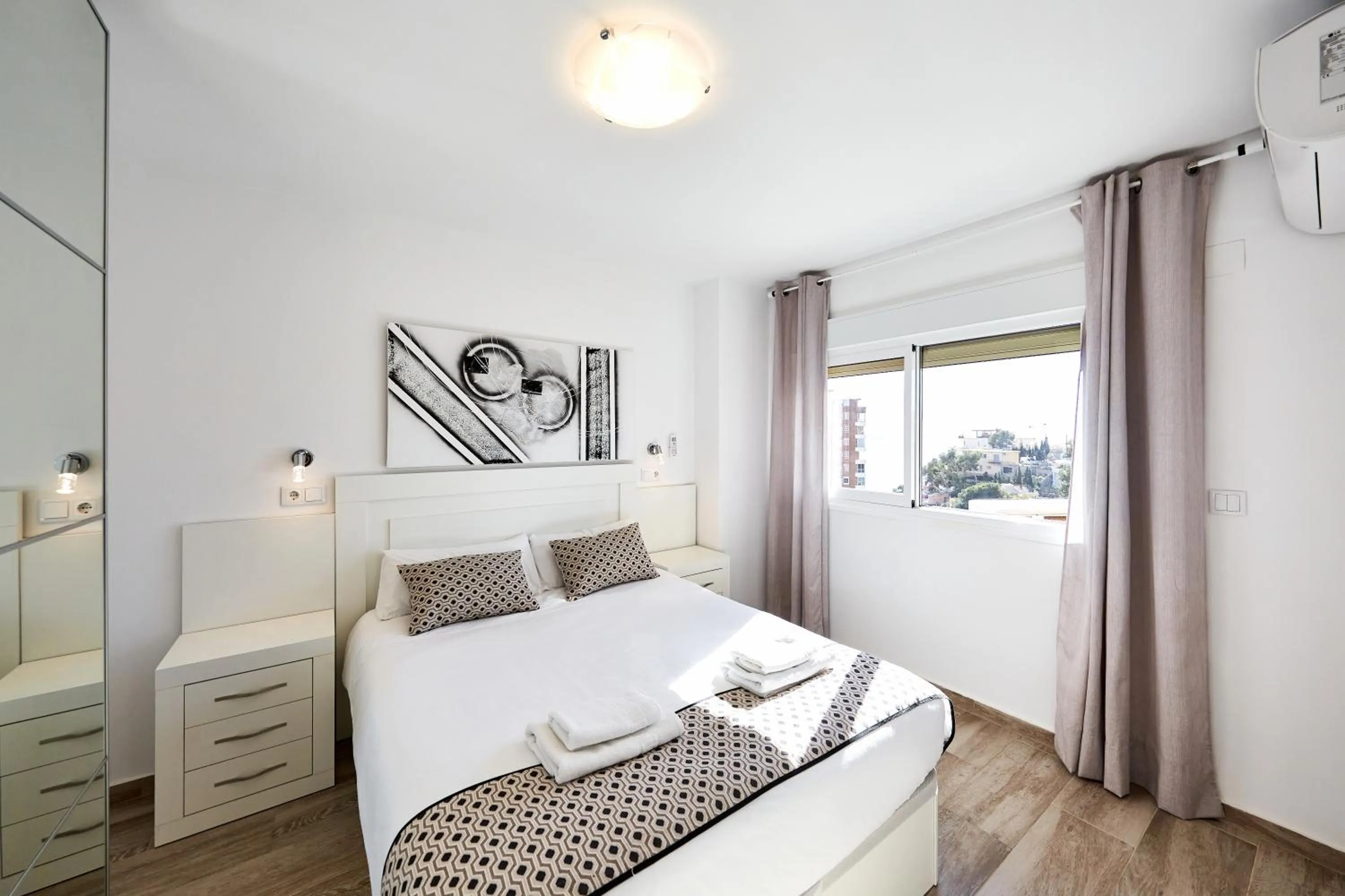 Bed in Sonrisa Apartments