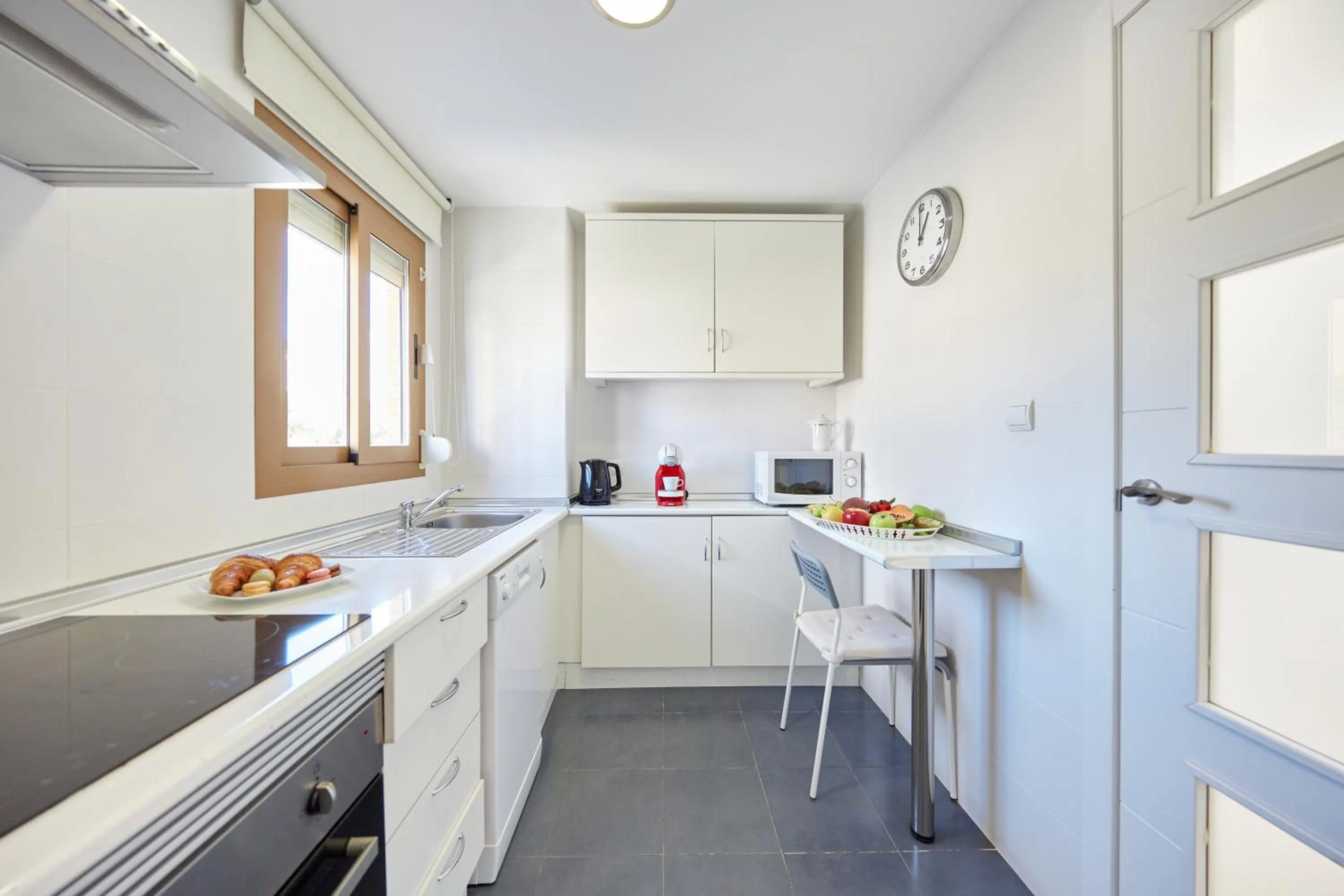 Kitchen or kitchenette in Sonrisa Apartments