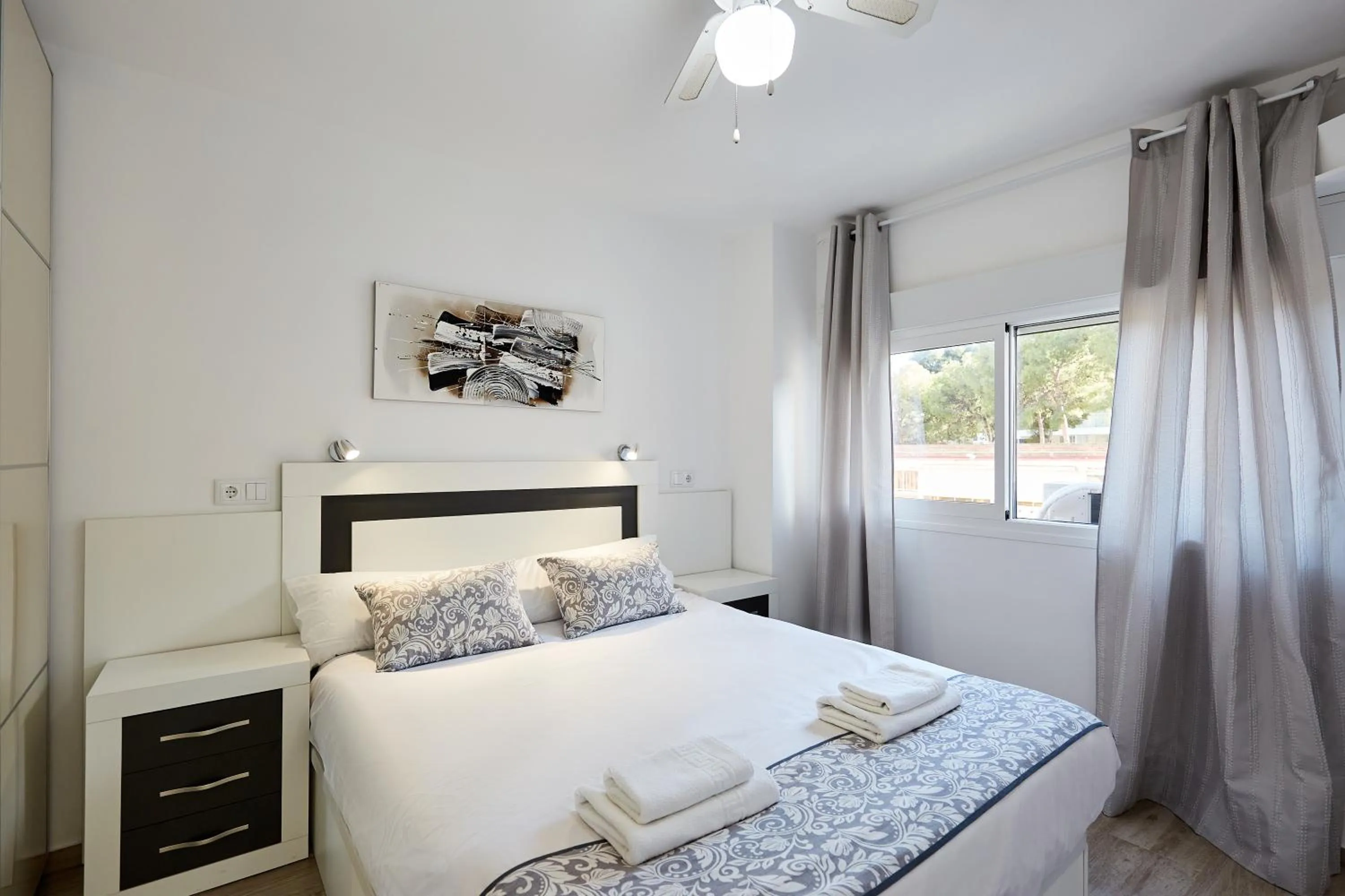 Bed in Sonrisa Apartments