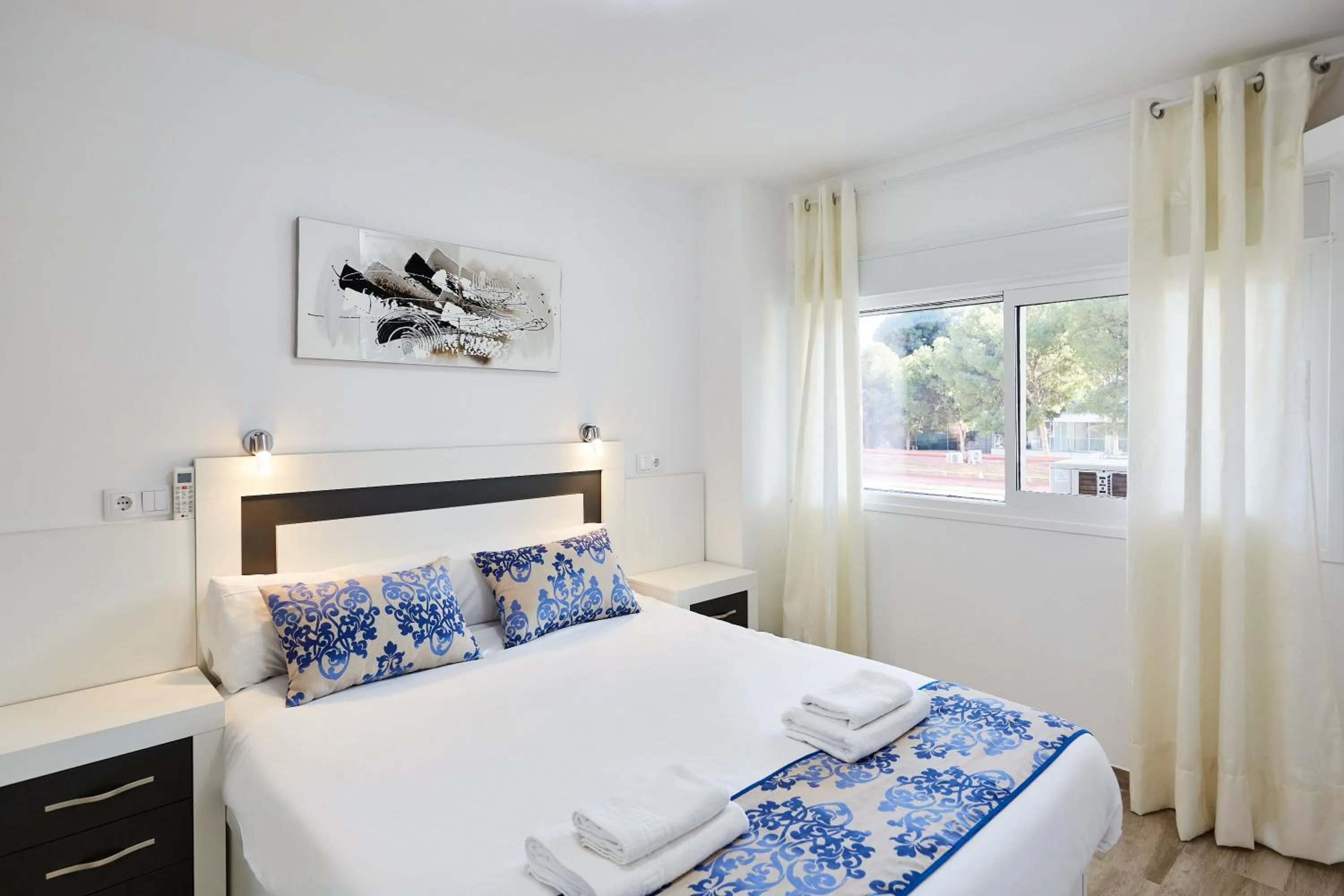 Bed in Sonrisa Apartments