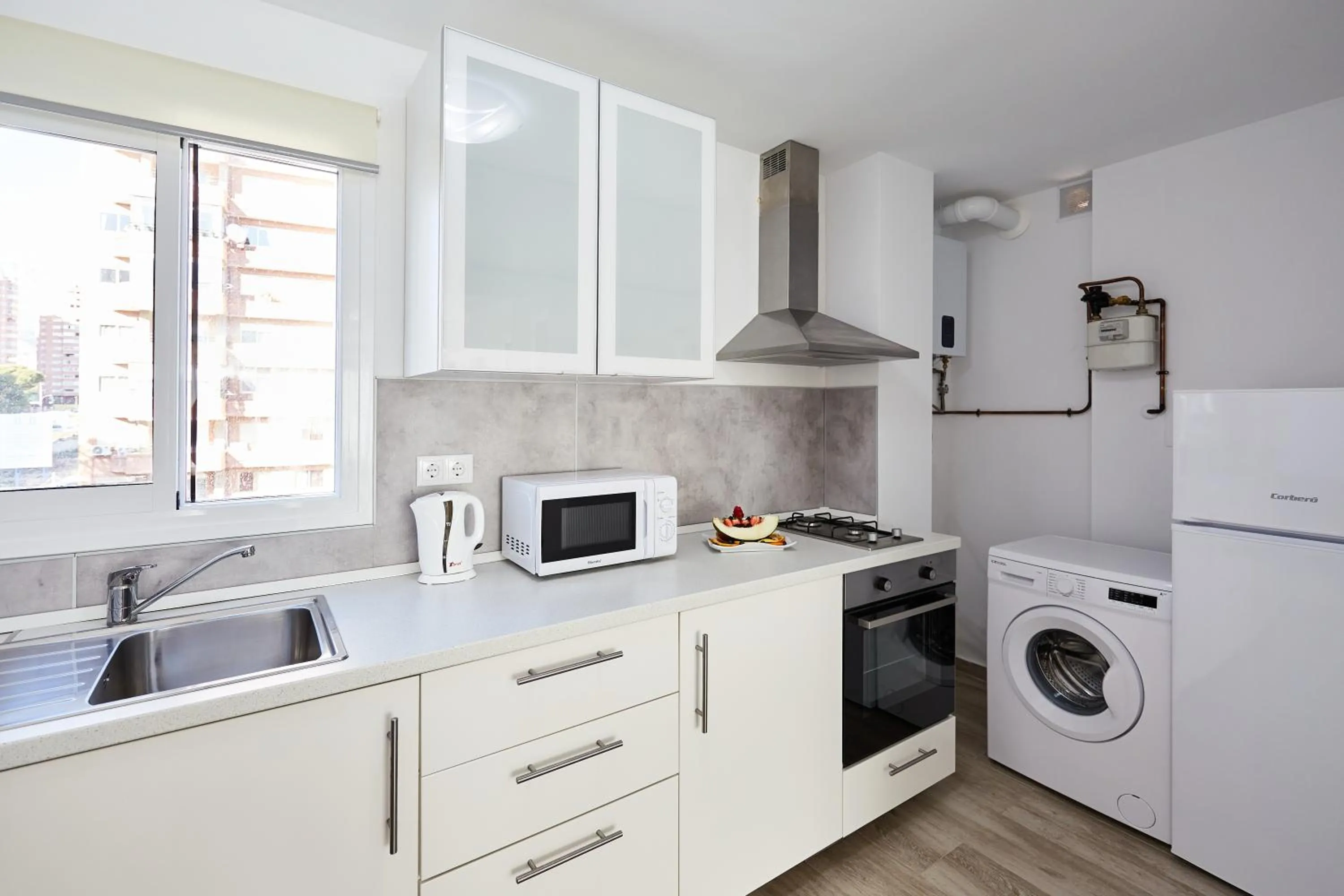 Kitchen or kitchenette in Sonrisa Apartments
