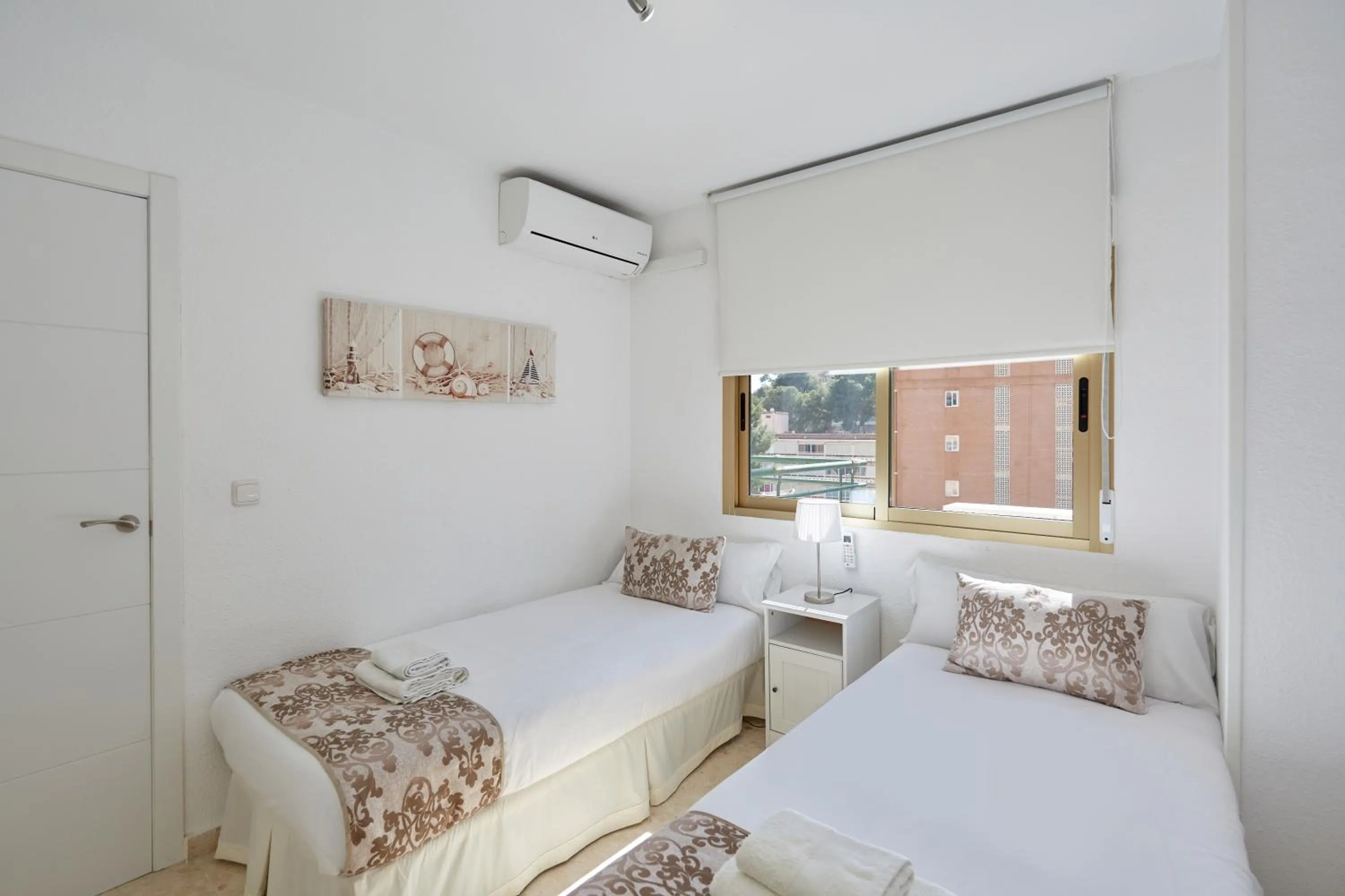 Bed in Sonrisa Apartments