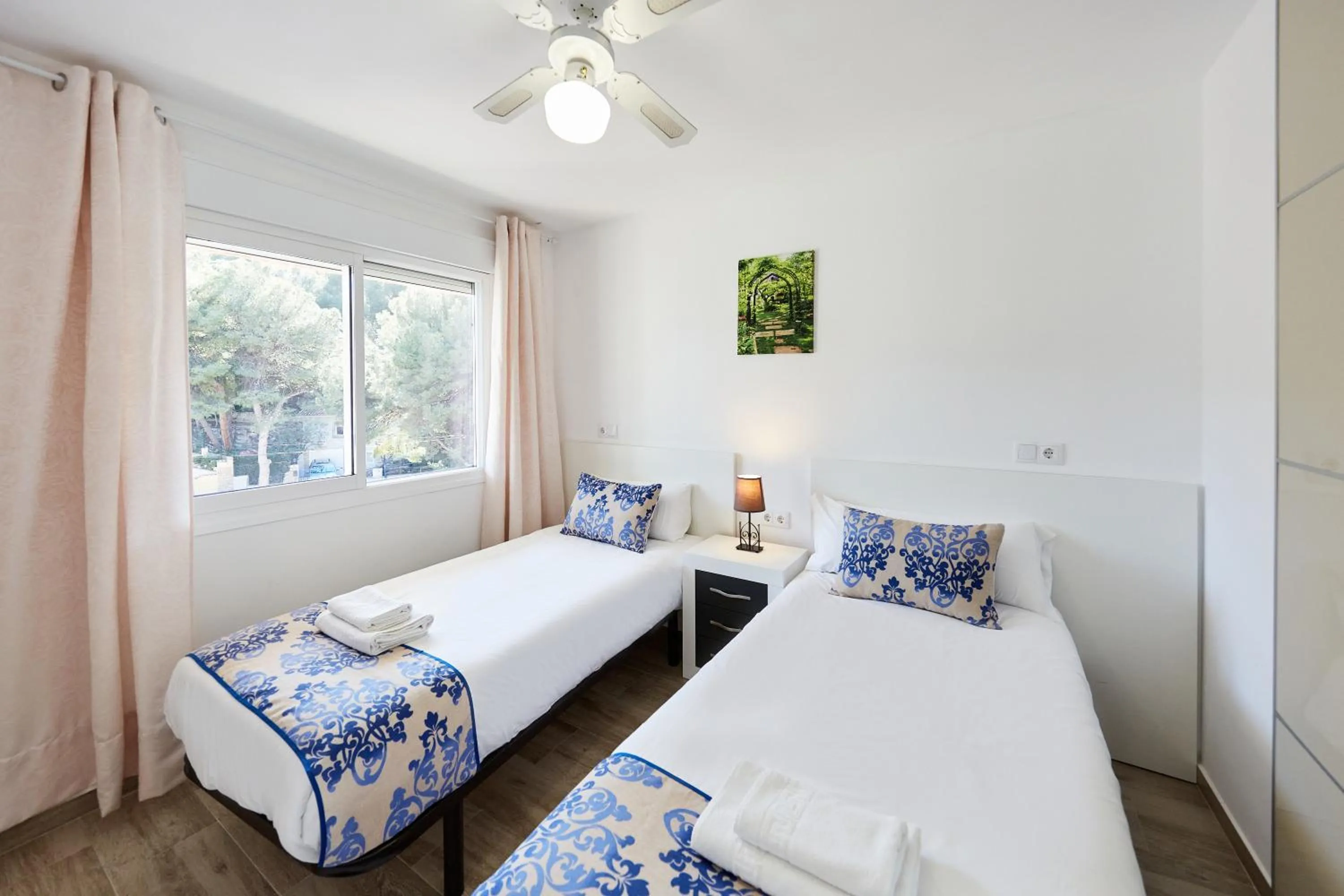 Bed in Sonrisa Apartments