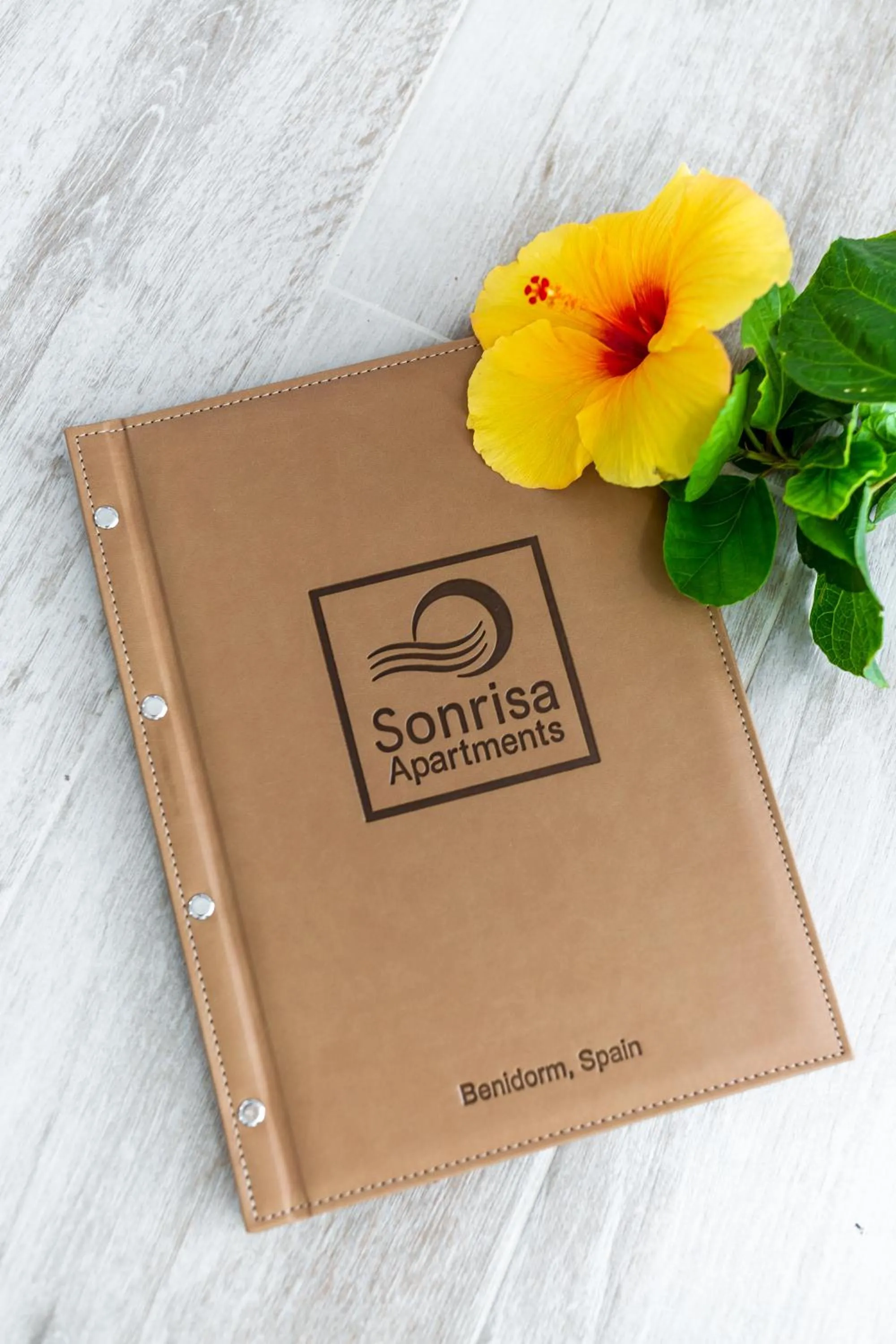 Property logo or sign in Sonrisa Apartments