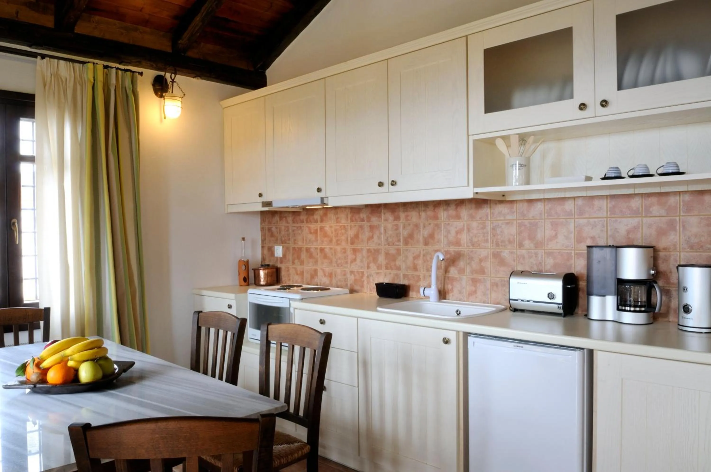 Kitchen or kitchenette in Esperos Suites & Villas