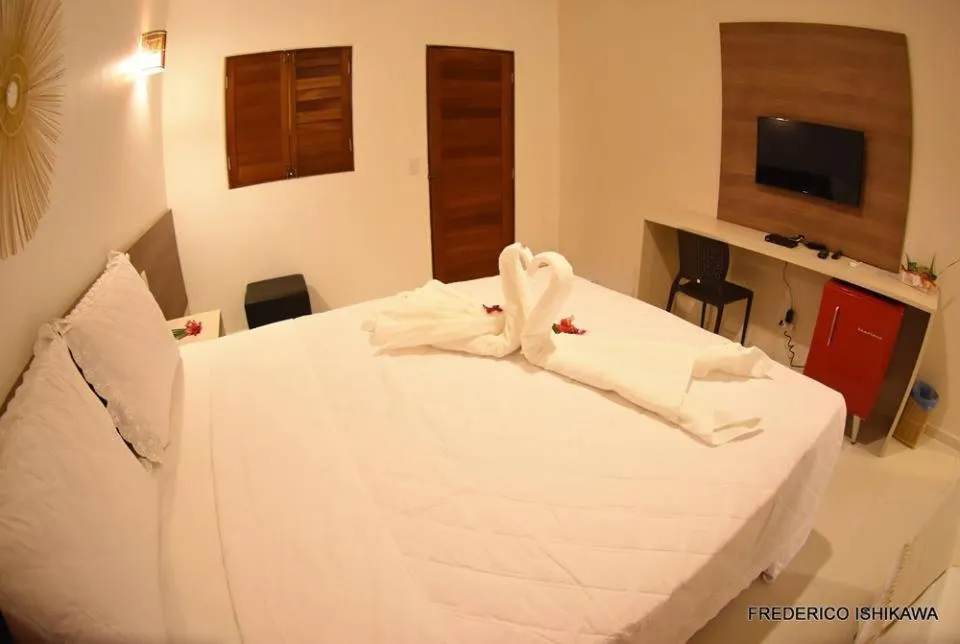 Bed in Pousada Porto Manguaba