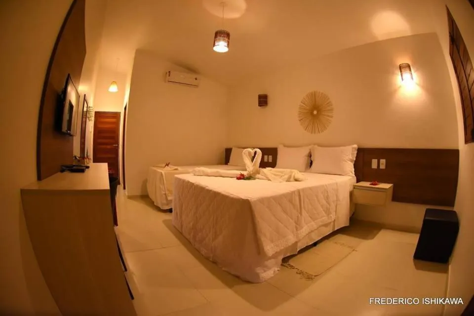 Bed in Pousada Porto Manguaba