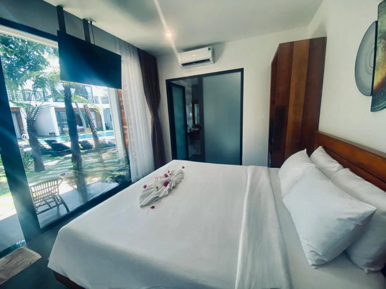 Photo of the whole room, Bed in Tuong Vy Boutique Hotel Mui Ne