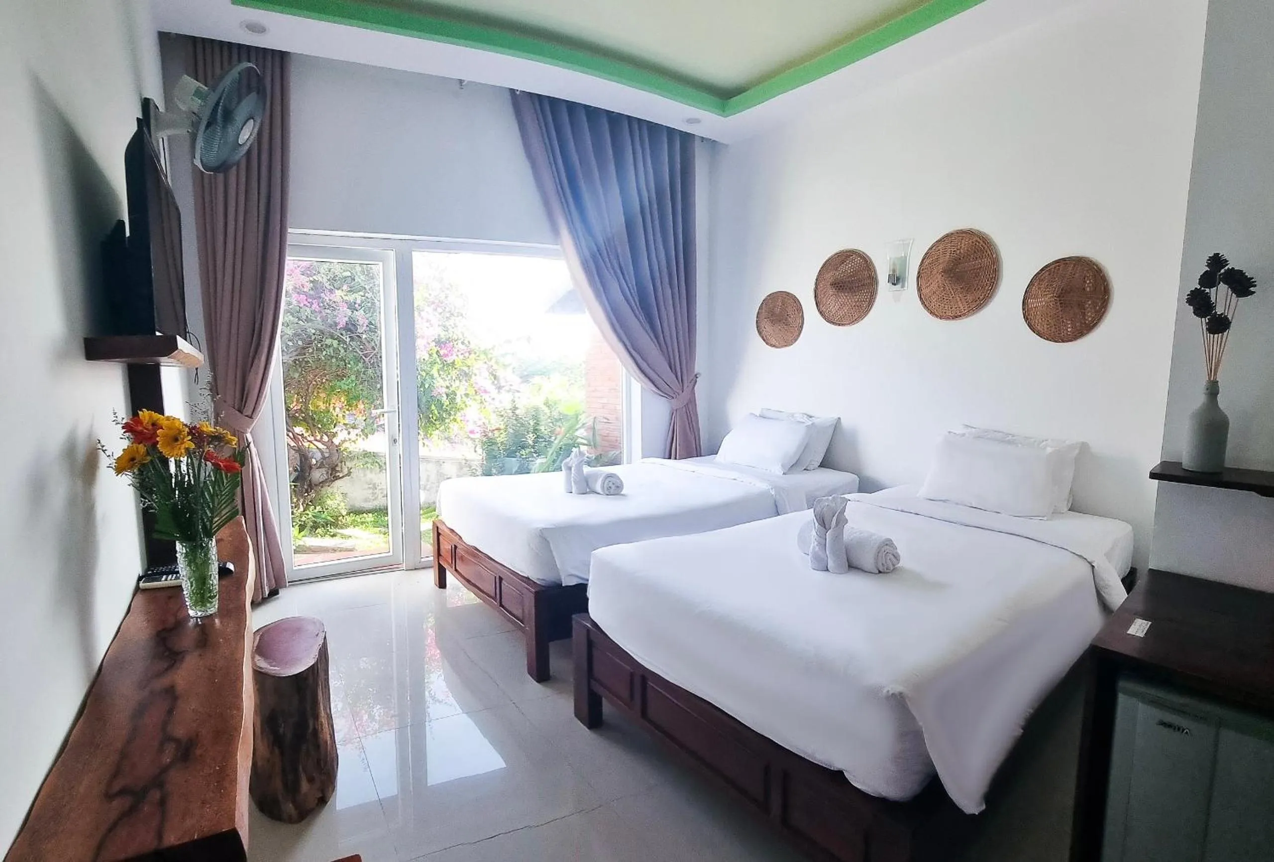 Photo of the whole room, Bed in Tuong Vy Boutique Hotel Mui Ne