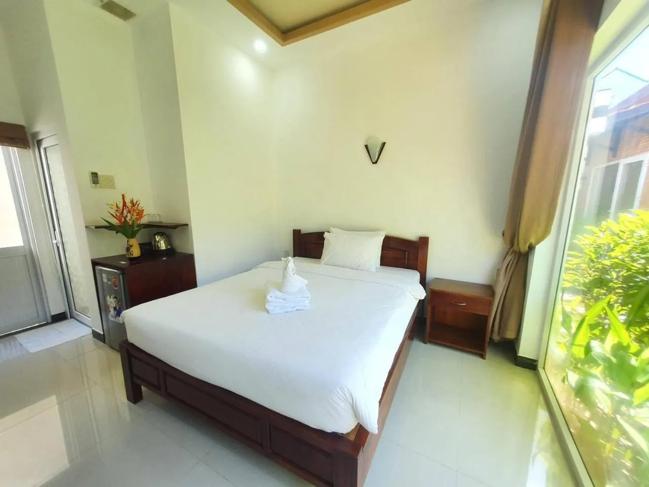 Photo of the whole room, Bed in Tuong Vy Boutique Hotel Mui Ne
