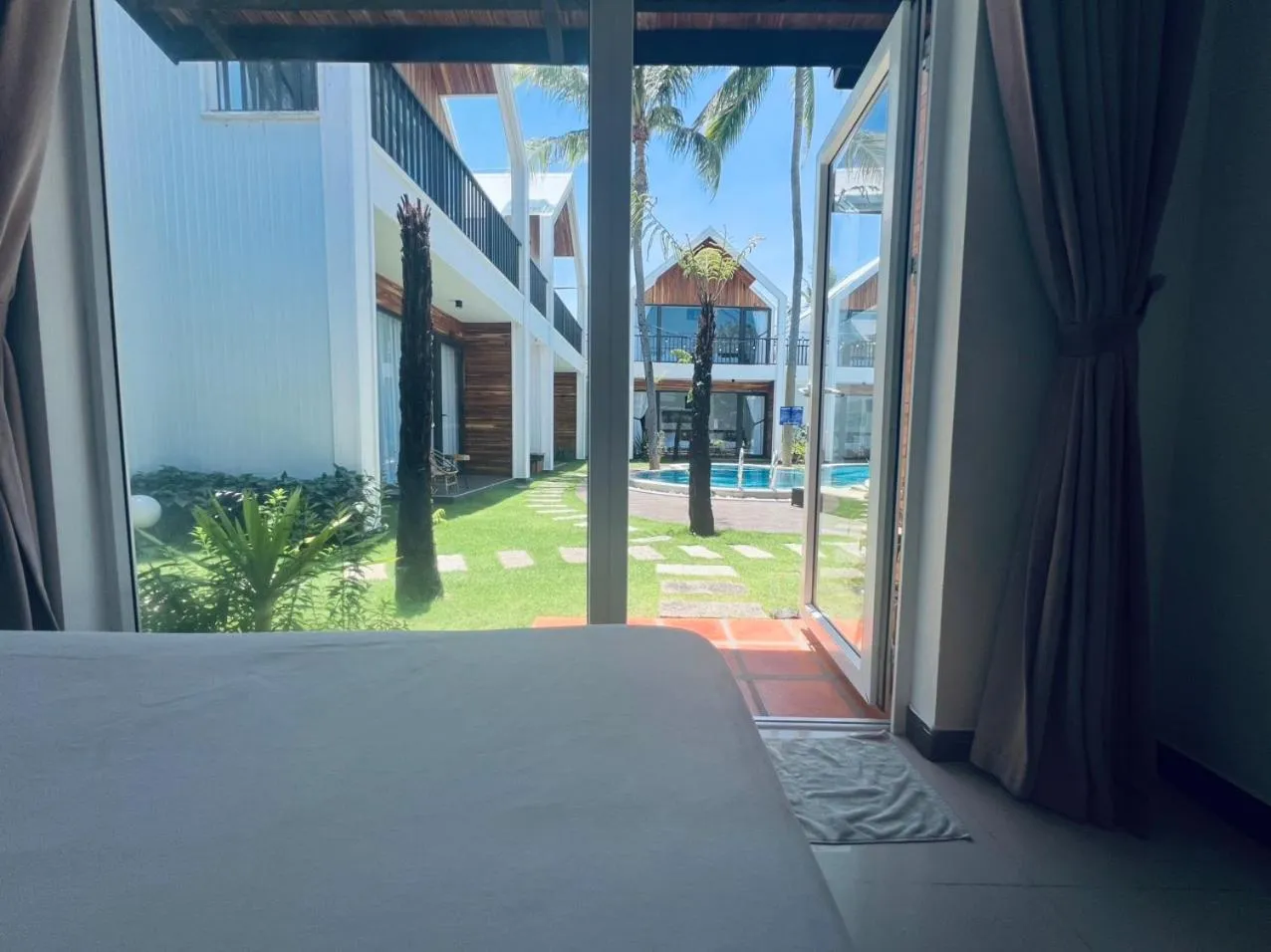 Photo of the whole room, Bed in Tuong Vy Boutique Hotel Mui Ne