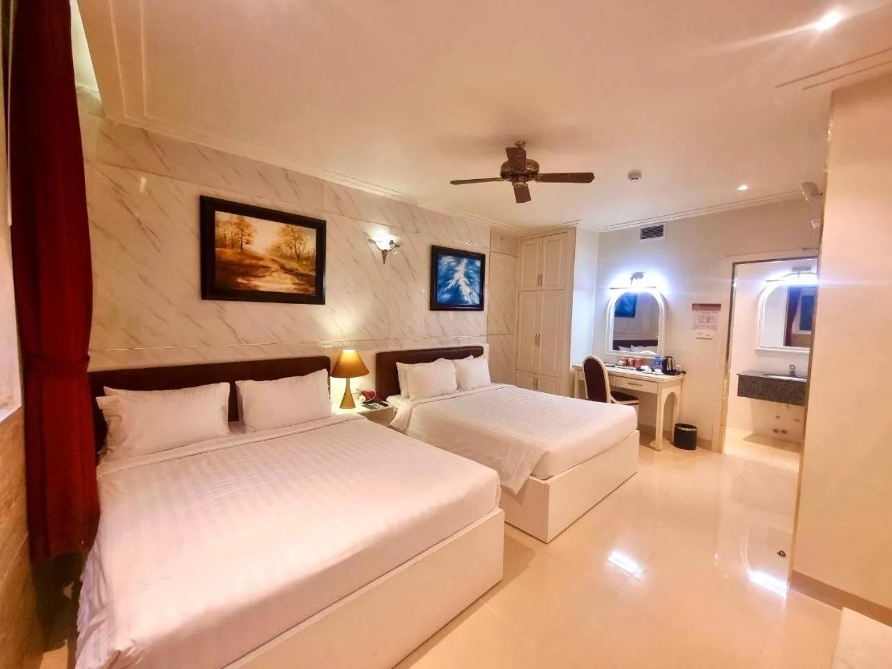 Bed in Tulip Hotel 3