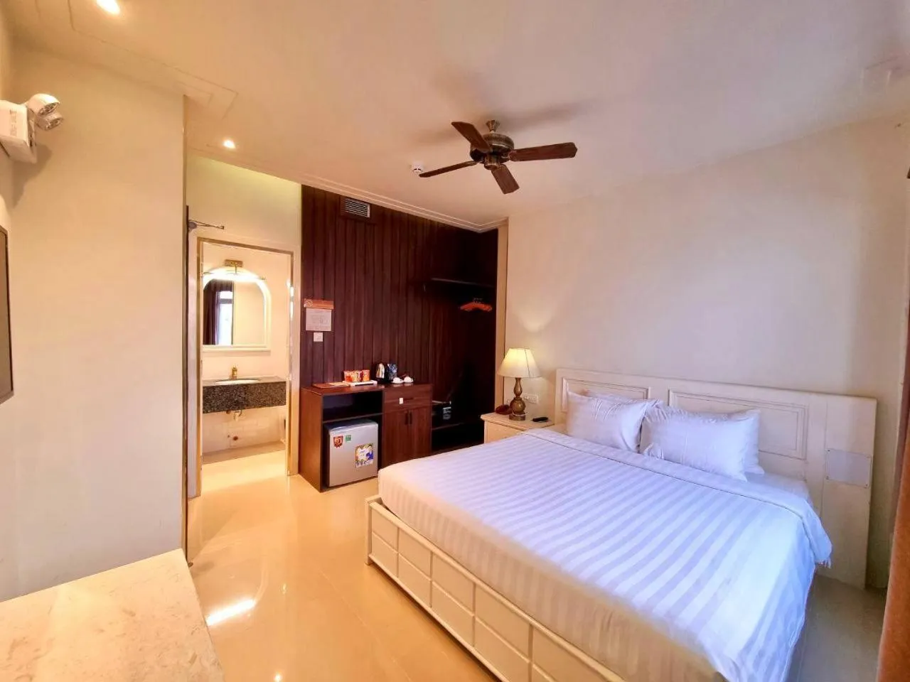 Bed in Tulip Hotel 3