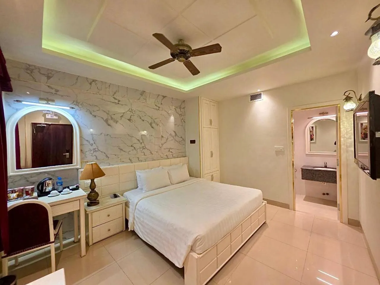 Bed in Tulip Hotel 3