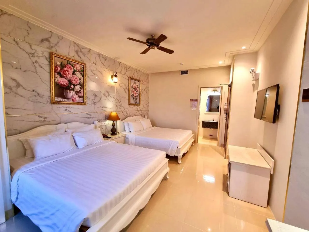 Bed in Tulip Hotel 3