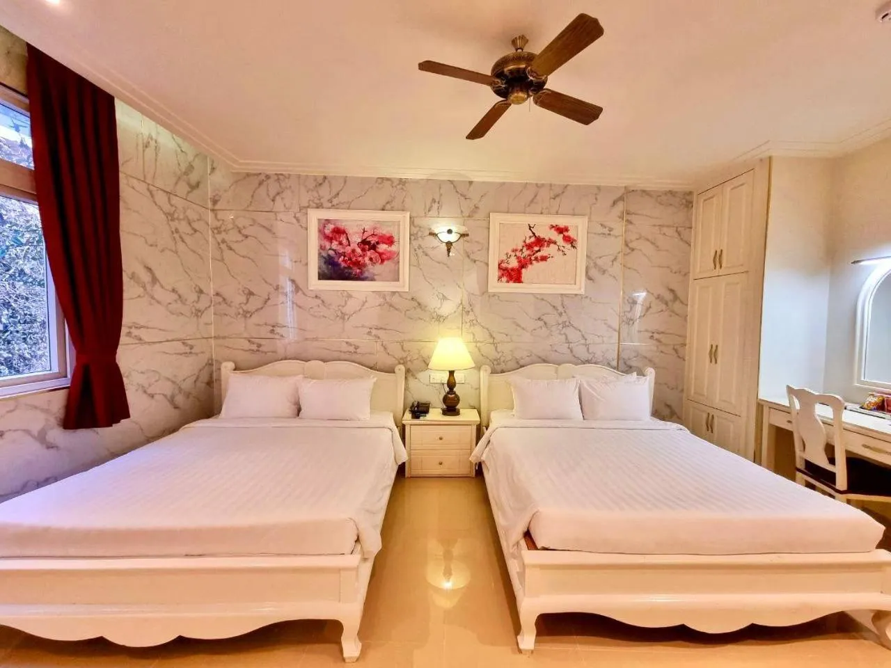 Bed in Tulip Hotel 3