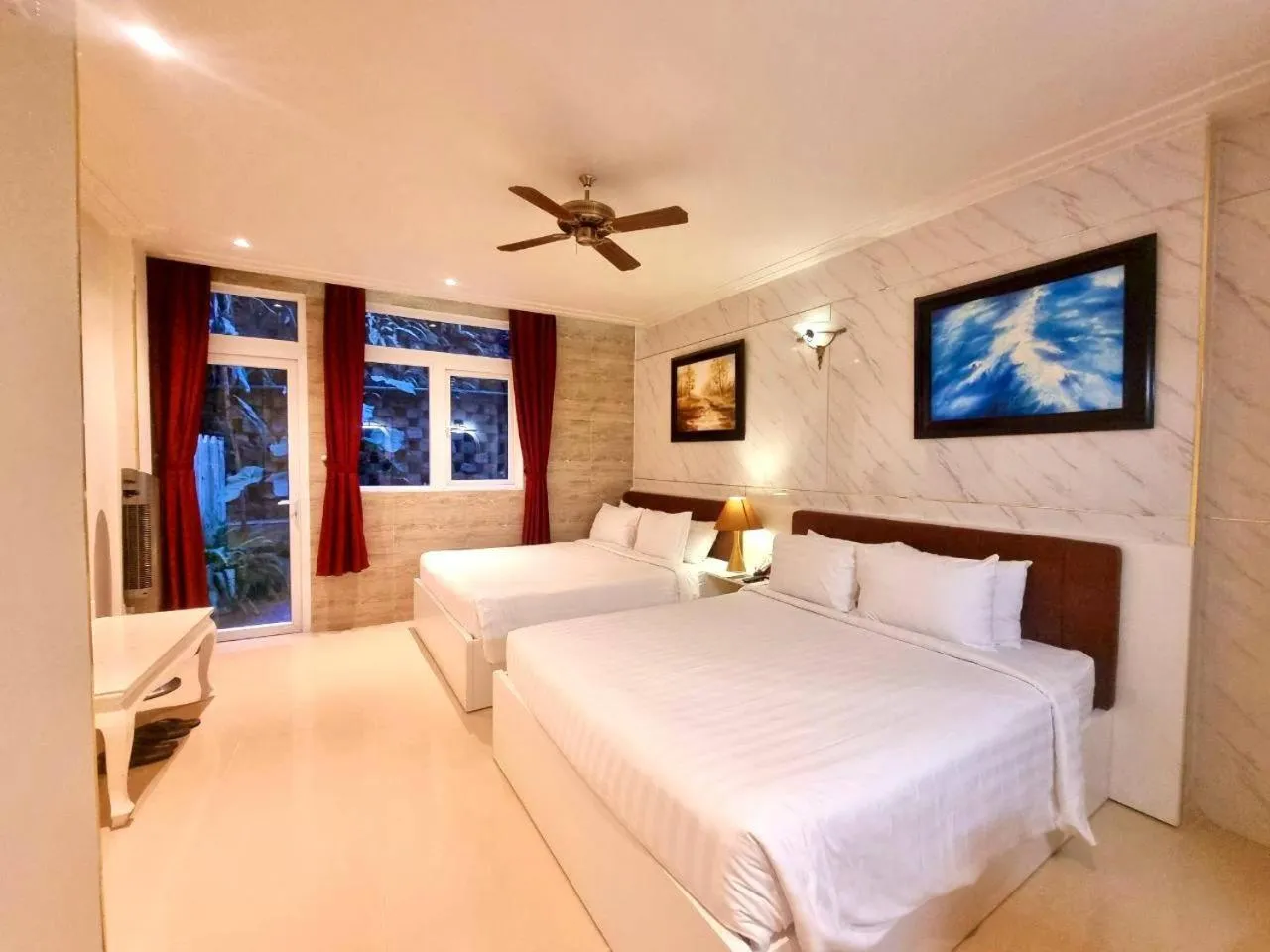 Bed in Tulip Hotel 3