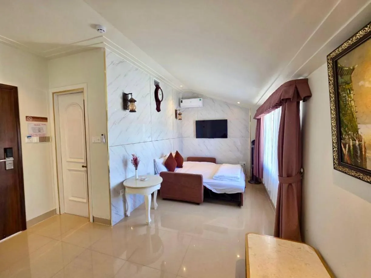 Bed in Tulip Hotel 3