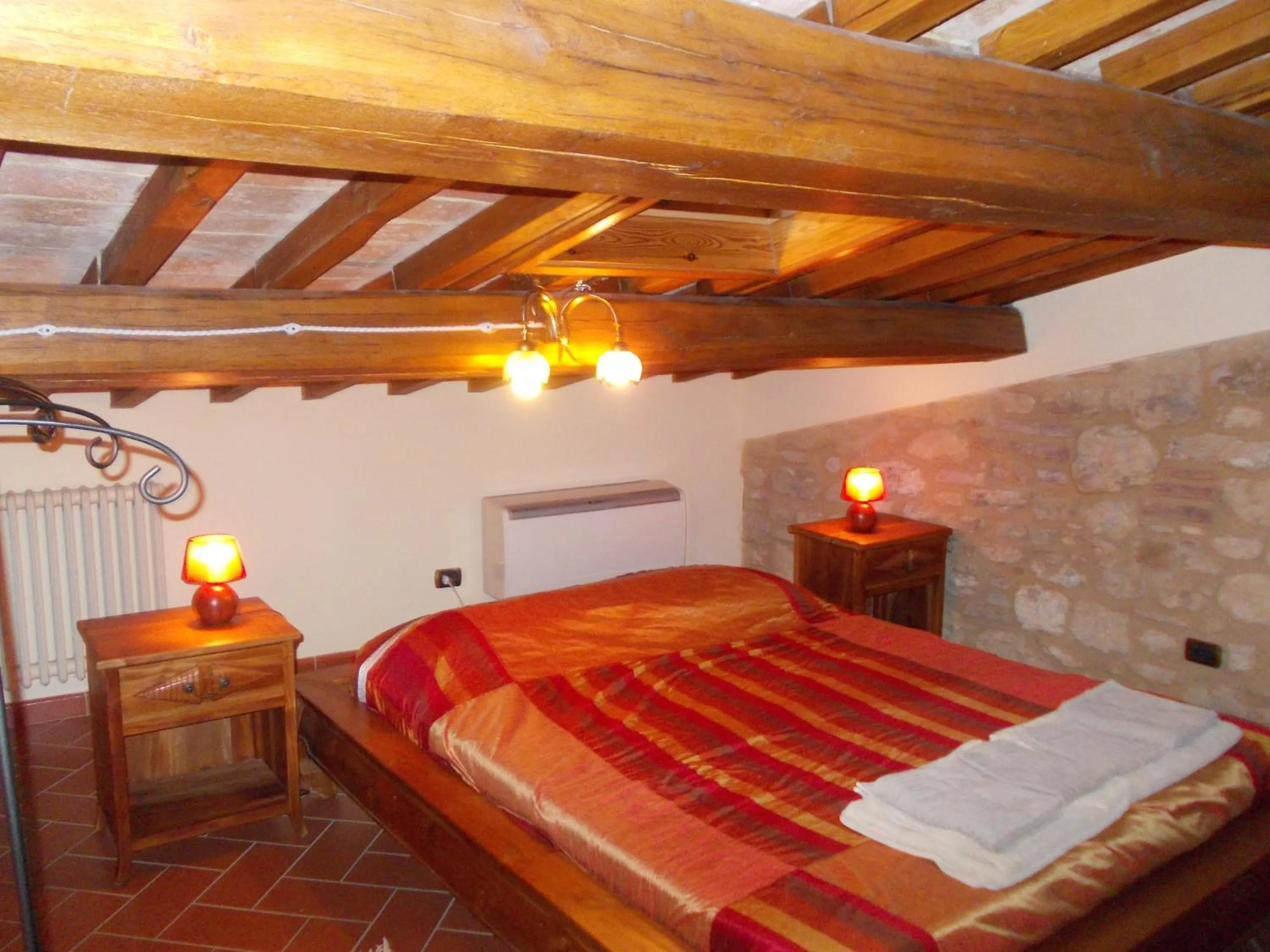 Guests, Bed in Le Pergoline B&B