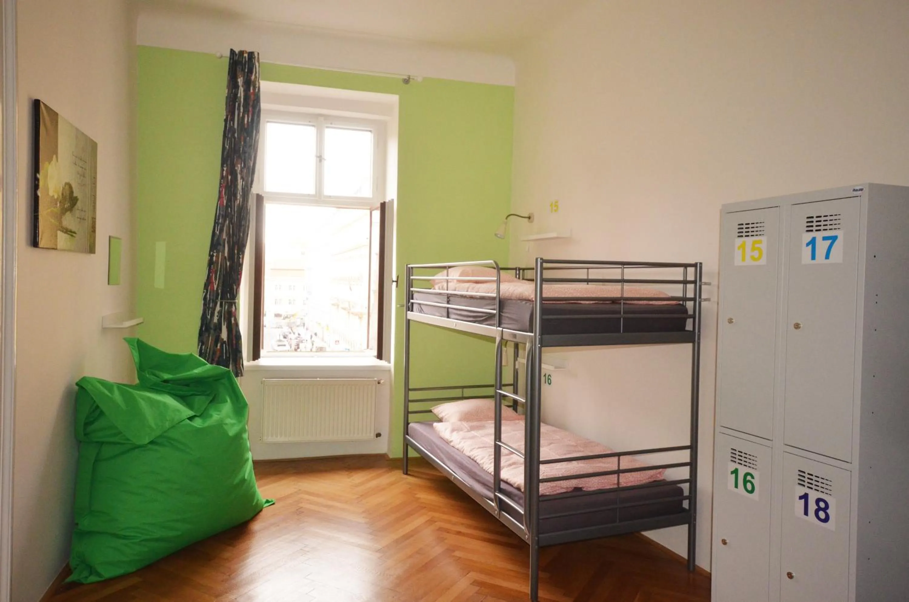 Seating area, Bed in Travel&Joy backpackers