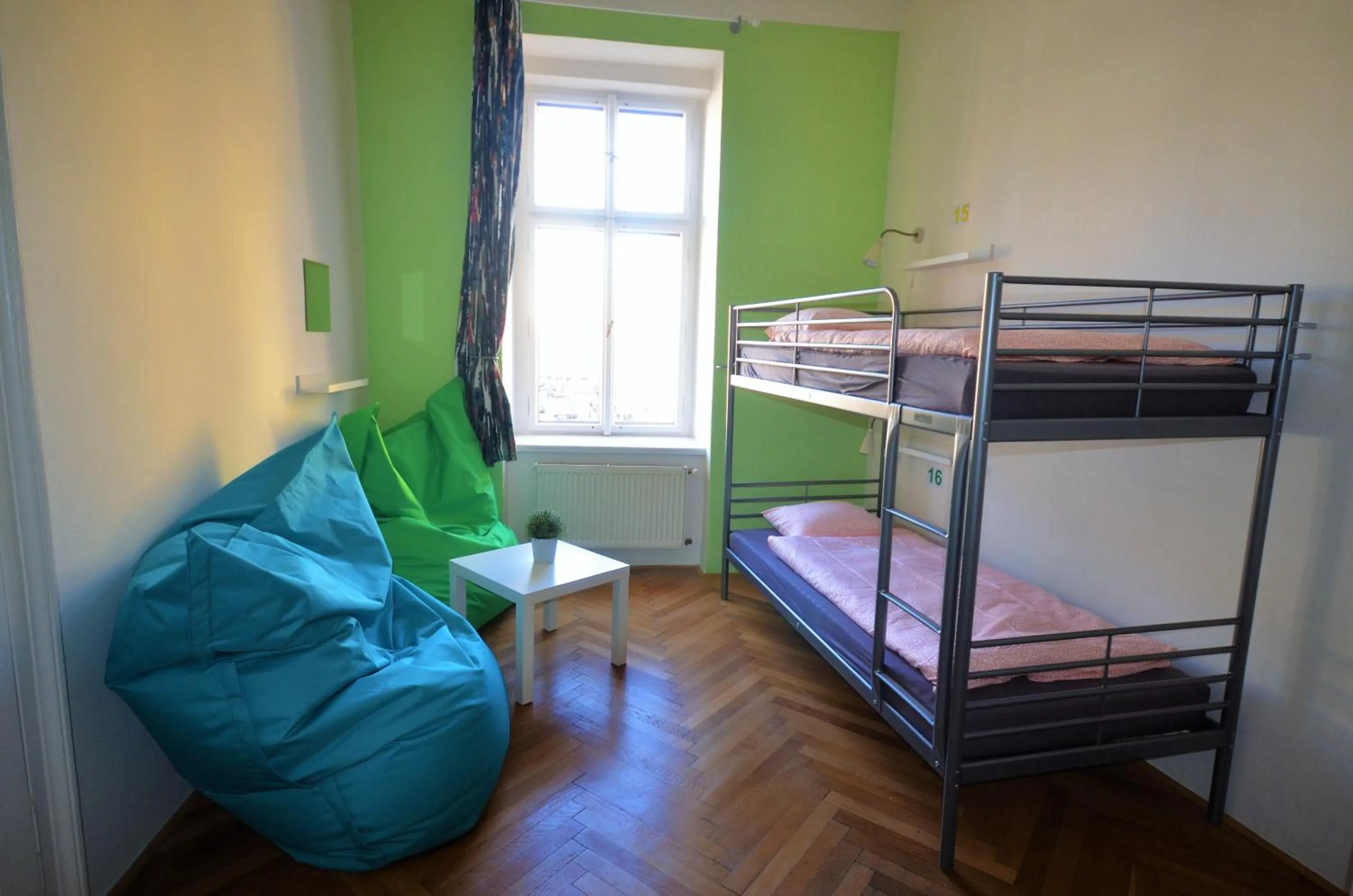 Seating area, Bed in Travel&Joy backpackers