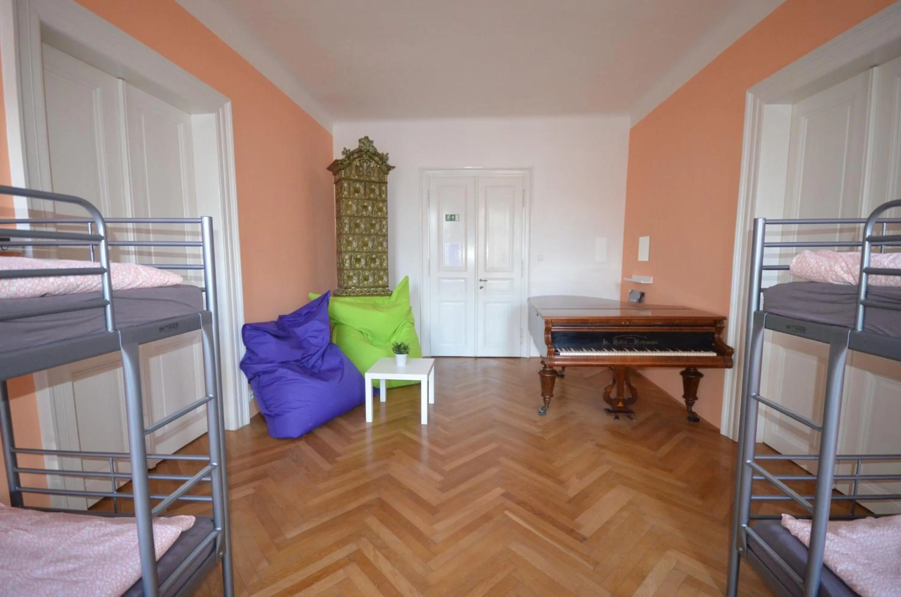 Seating area, Bed in Travel&Joy backpackers