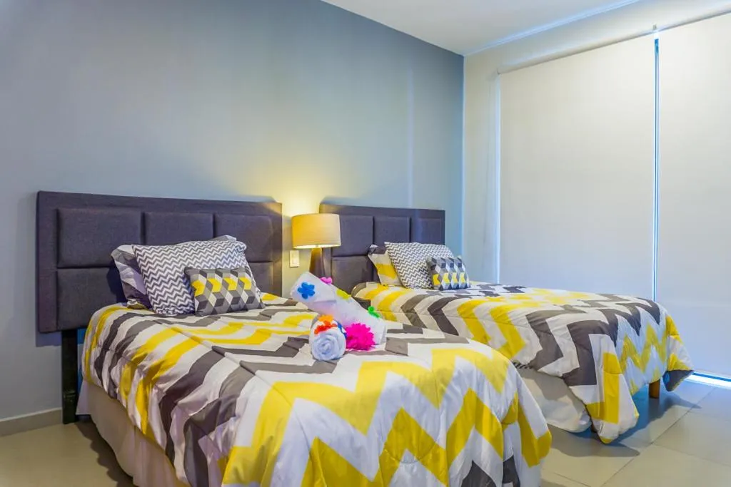 Bed in Lunada Condo by BVR