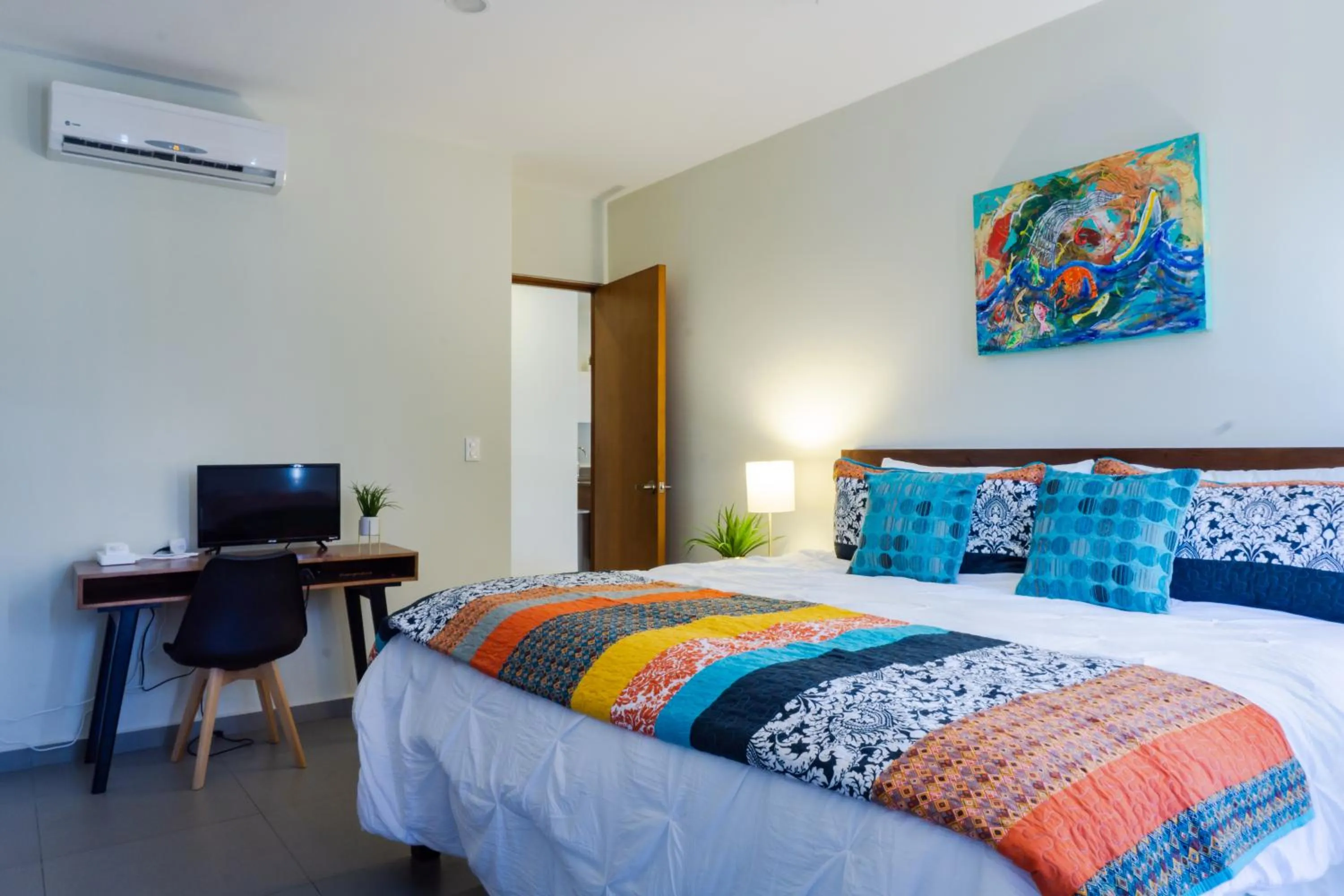 Photo of the whole room, Bed in Lunada Condo by BVR