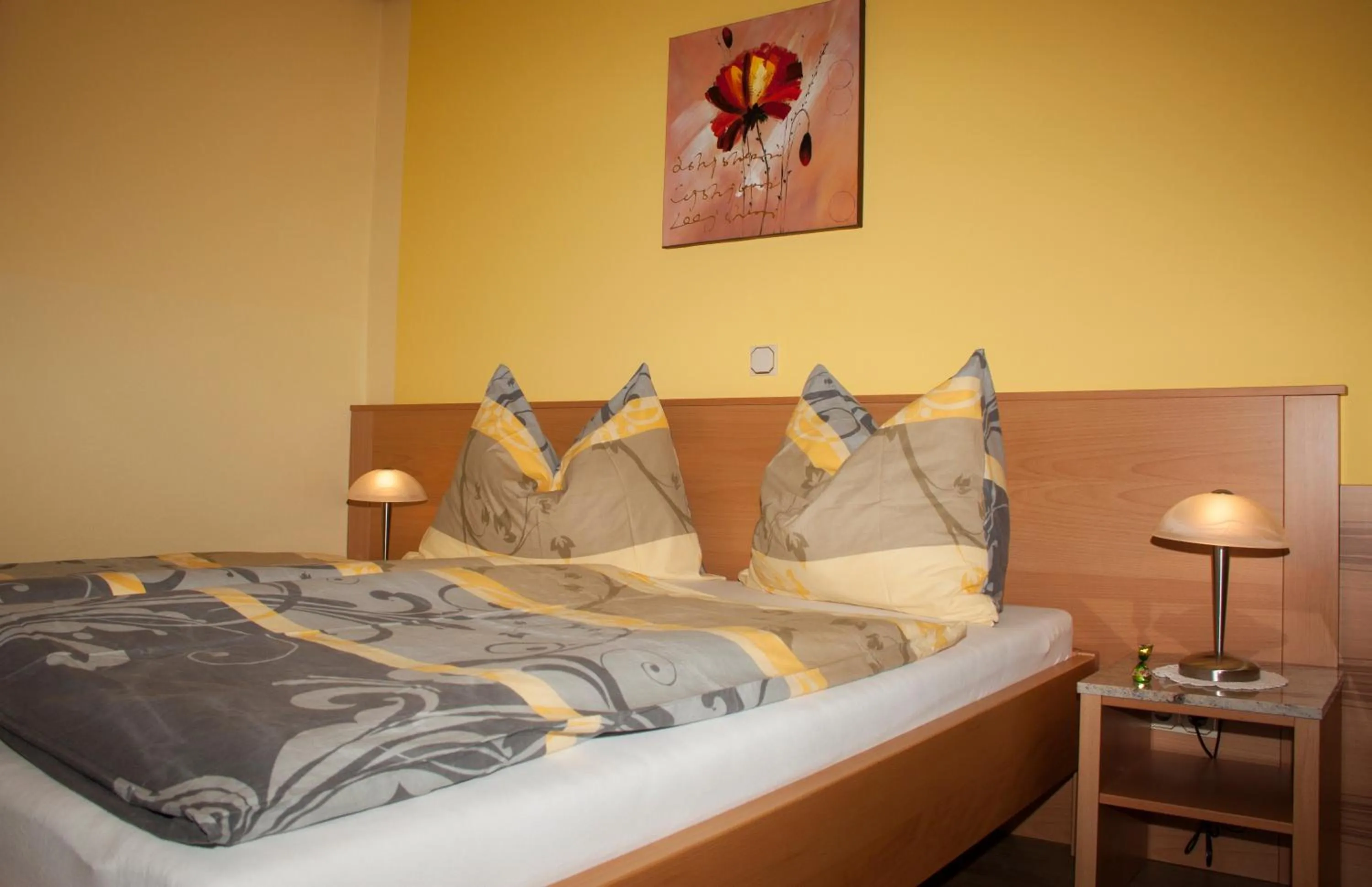 Bed in Frühstückspension Kuzmic