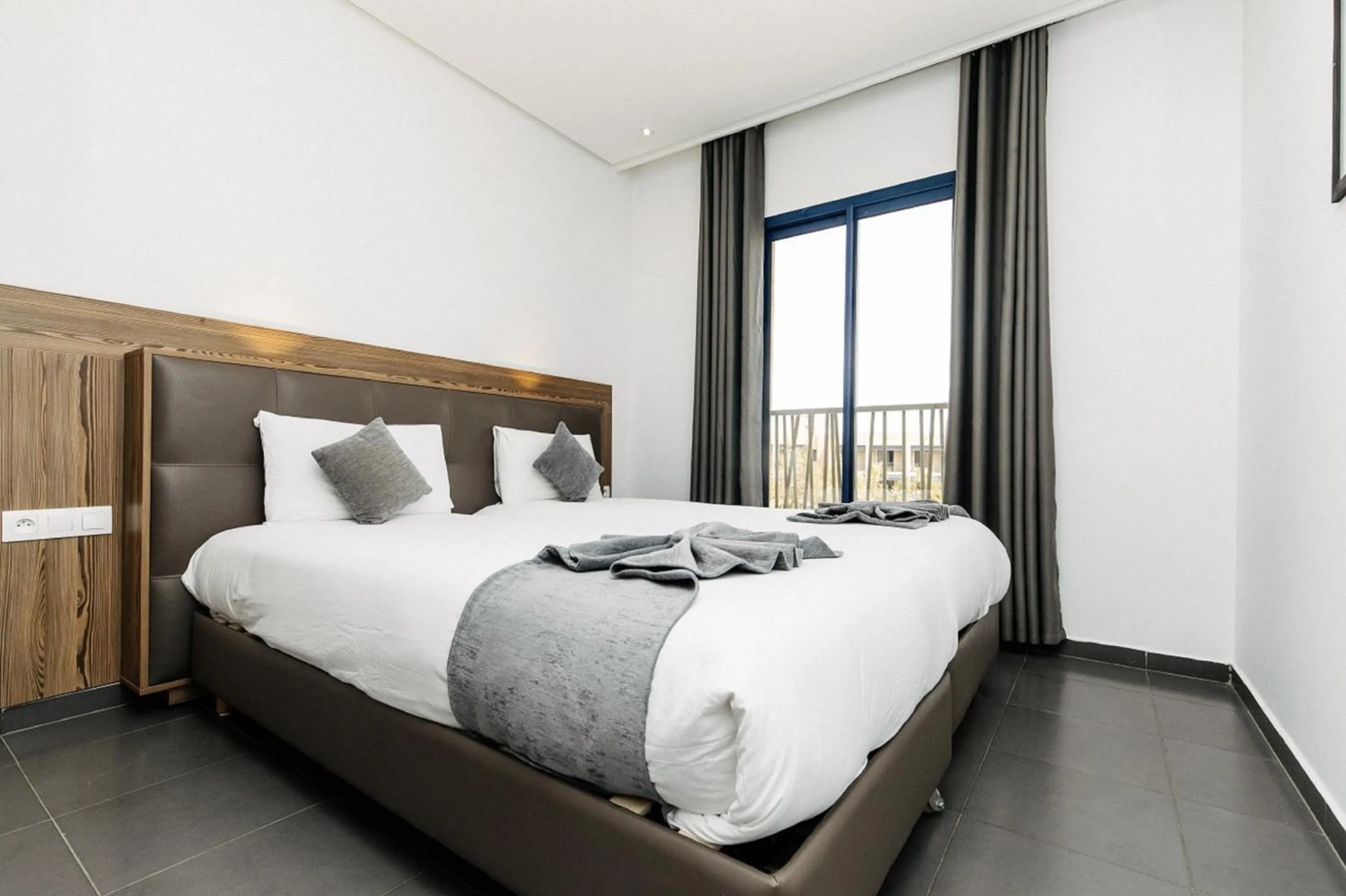 Bedroom, Bed in Wazo Appart-Hôtel