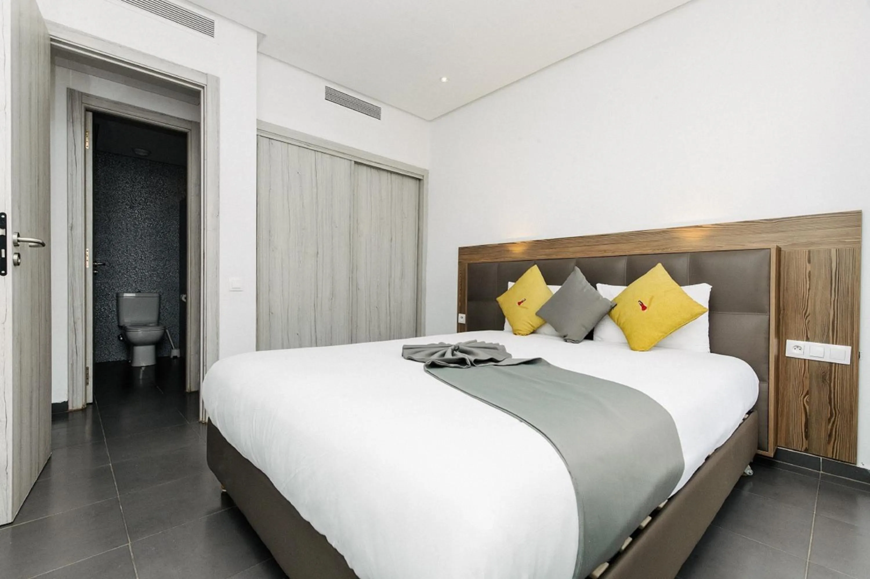 Bedroom, Bed in Wazo Appart-Hôtel