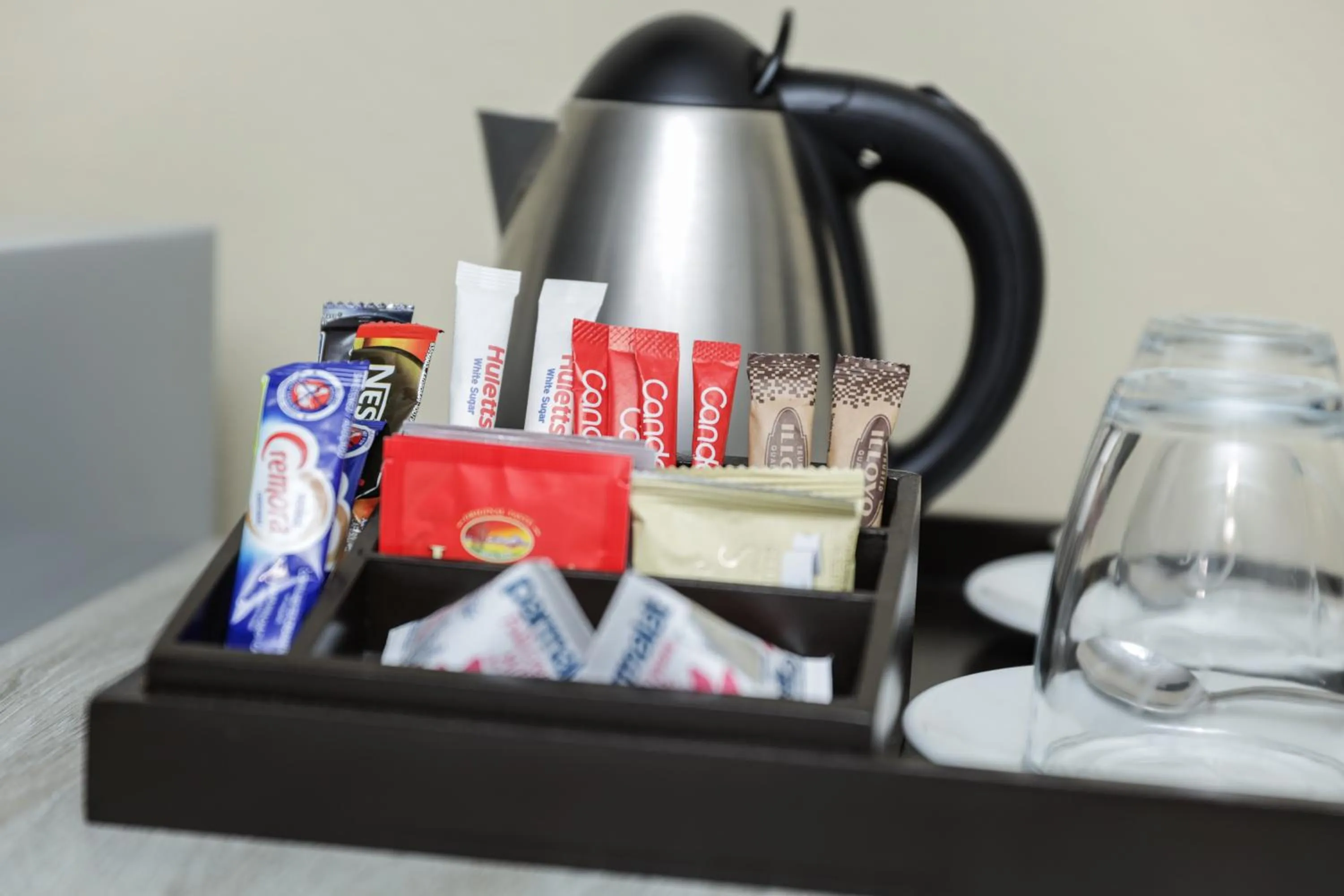 Coffee/tea facilities in Q's Boutique Stay