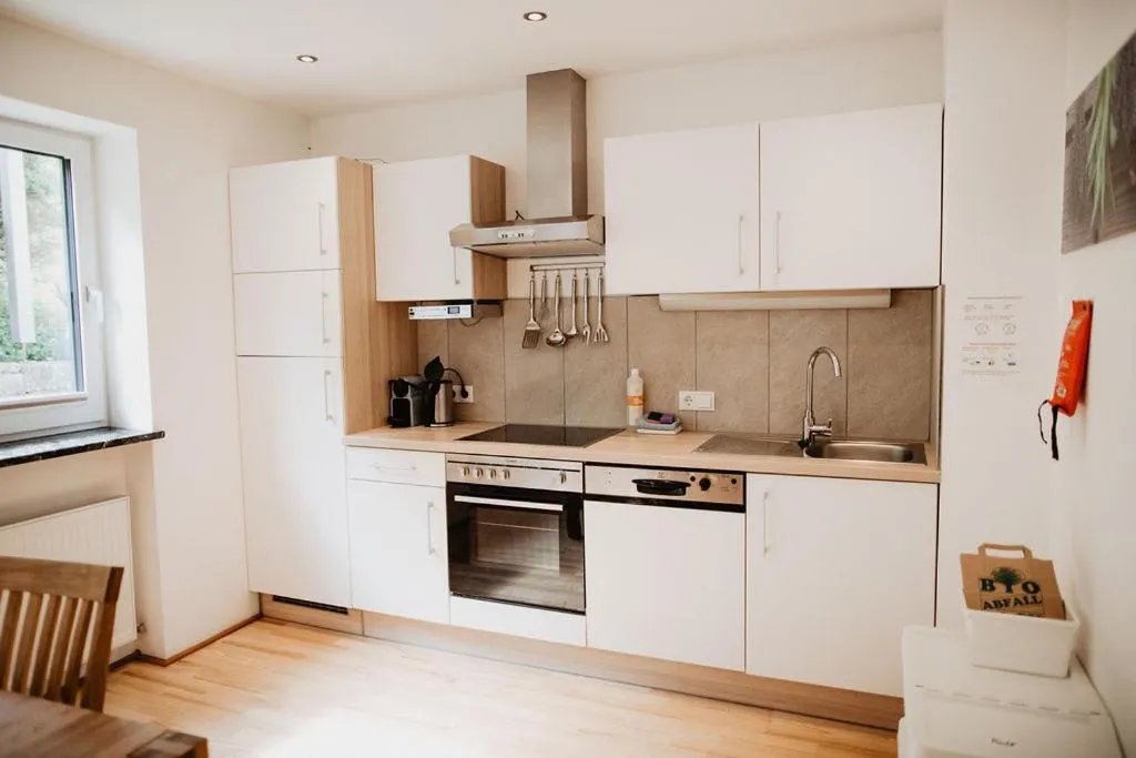 Kitchen or kitchenette in Ferienwohnungen Wartbichler