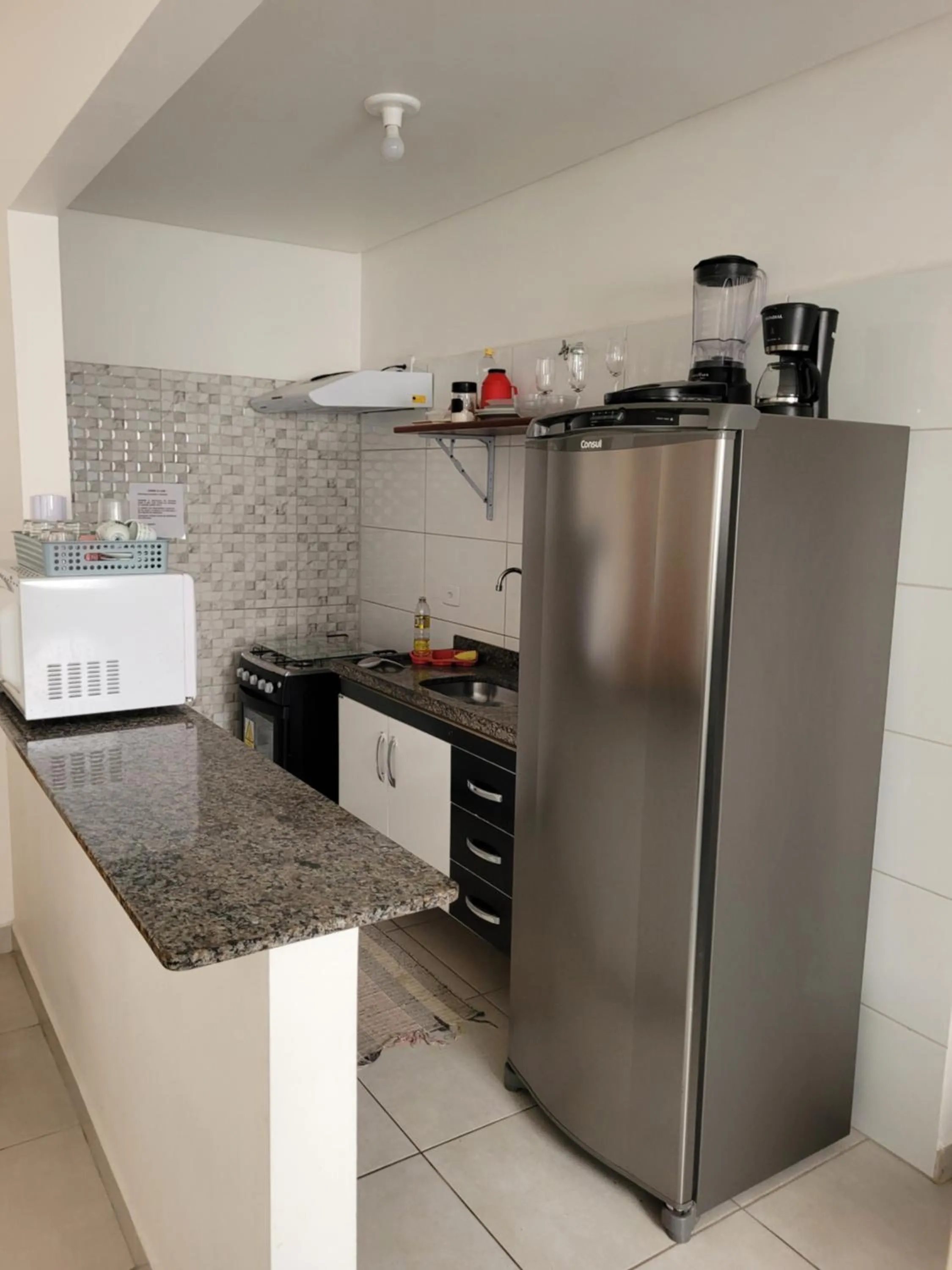 Kitchen or kitchenette in Apartamentos Gratitude