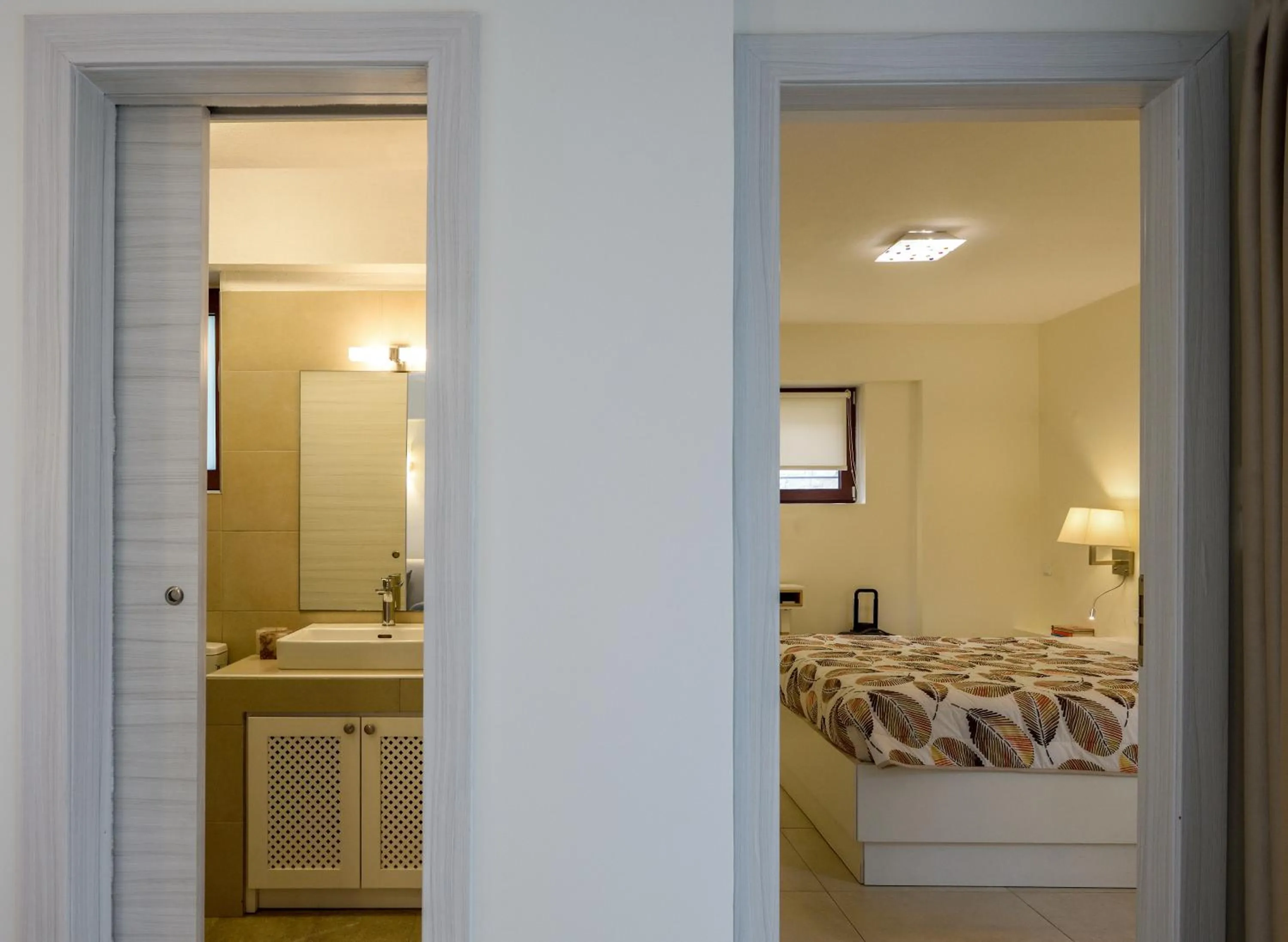 Bed in Elpiniki Luxury Apartments