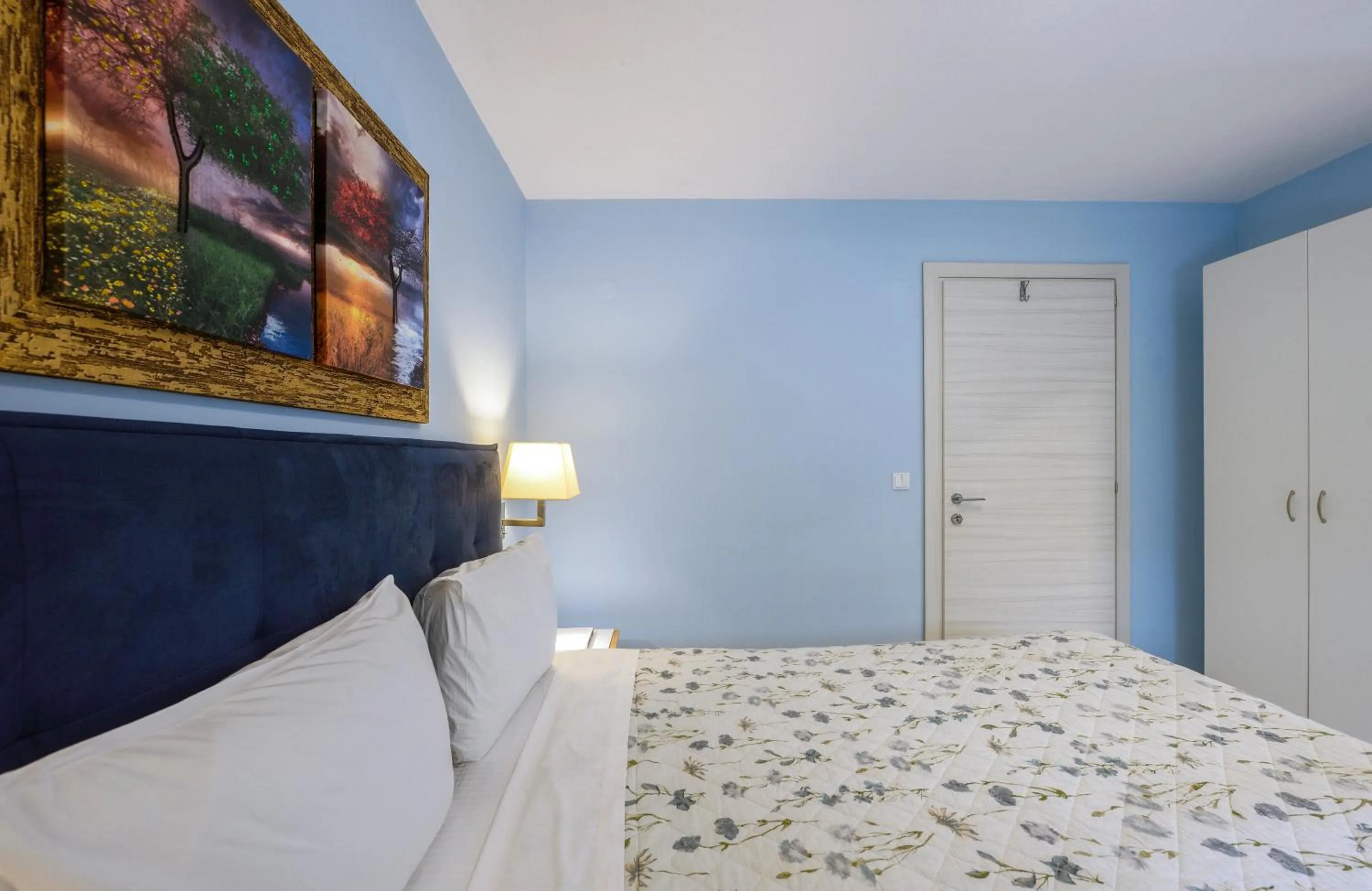 Bed in Elpiniki Luxury Apartments