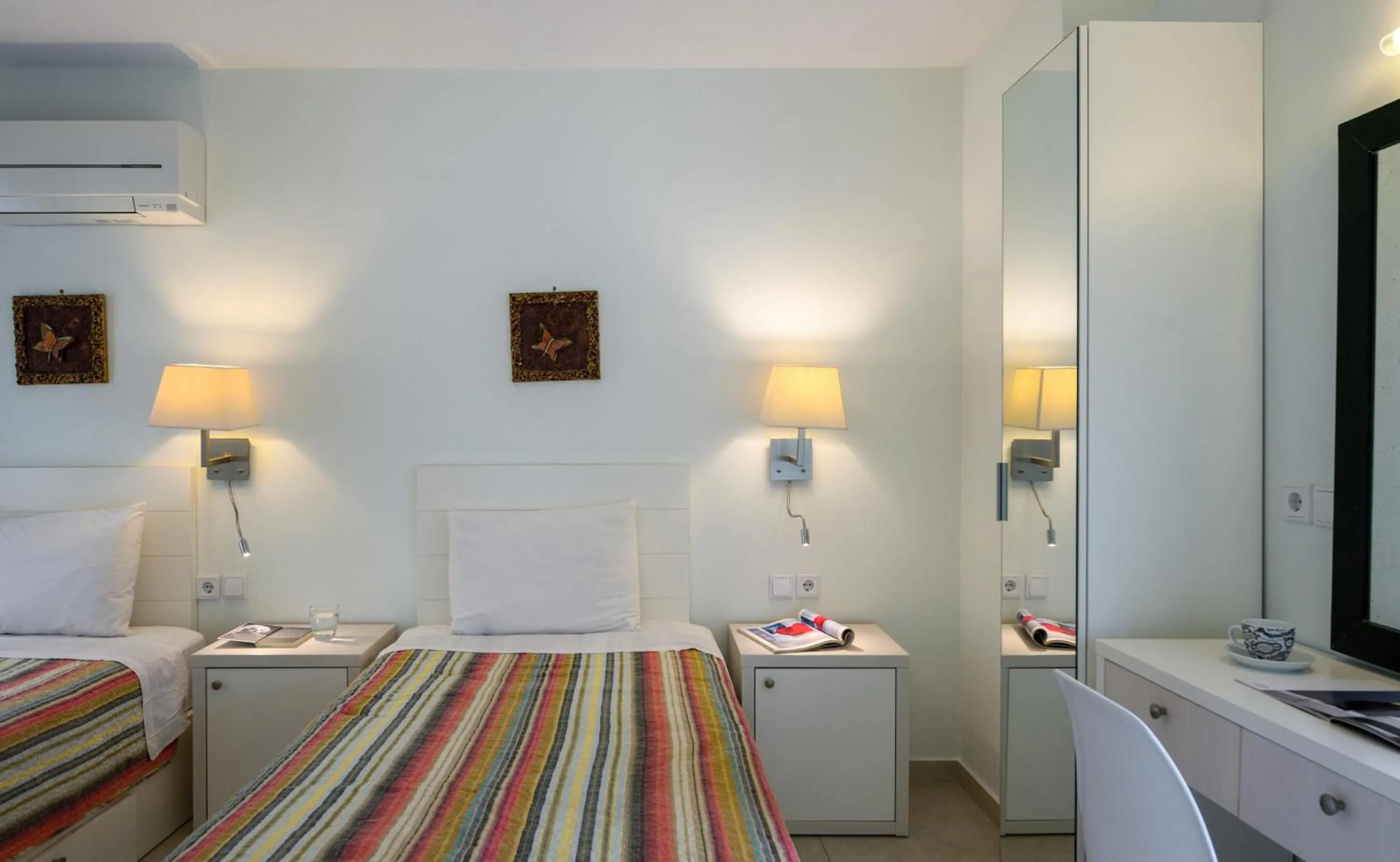 Bed in Elpiniki Luxury Apartments