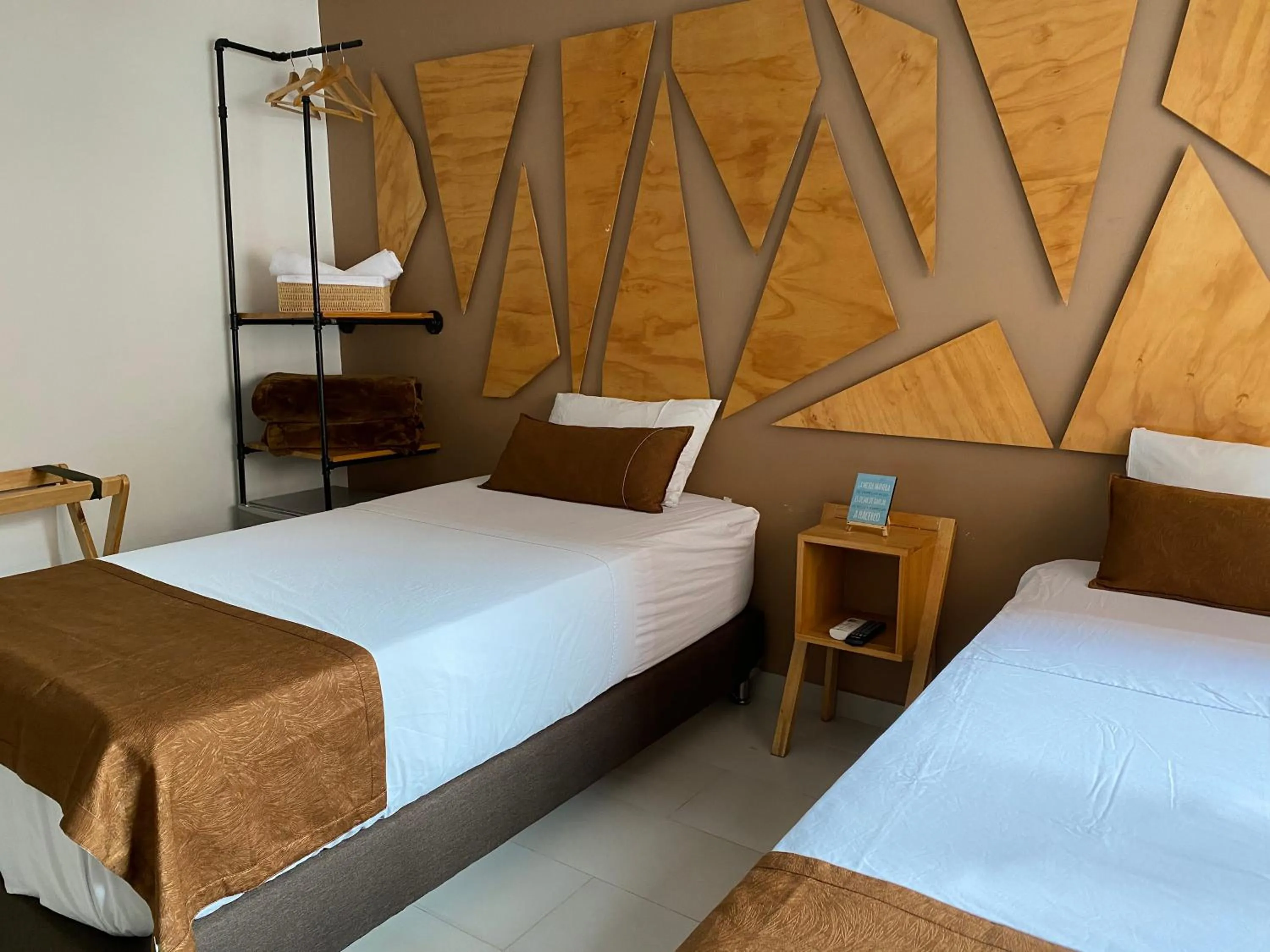 Bed in Rivière Boutique Hotel