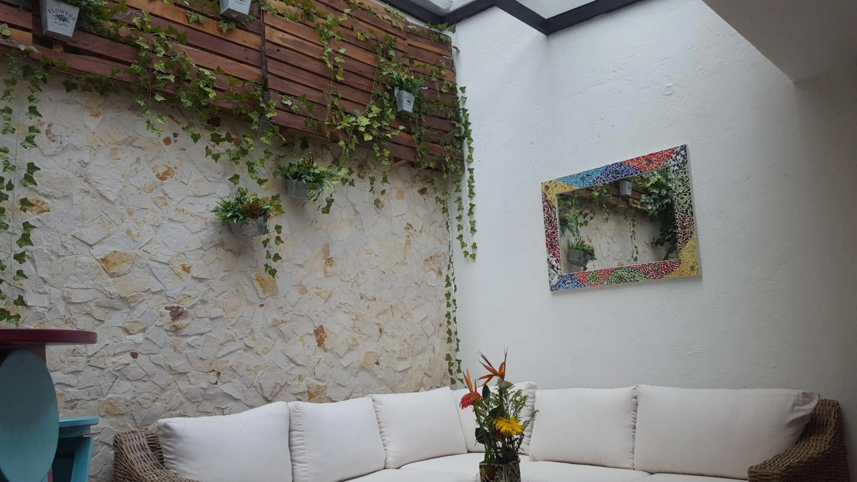 Seating area in Rivière Boutique Hotel
