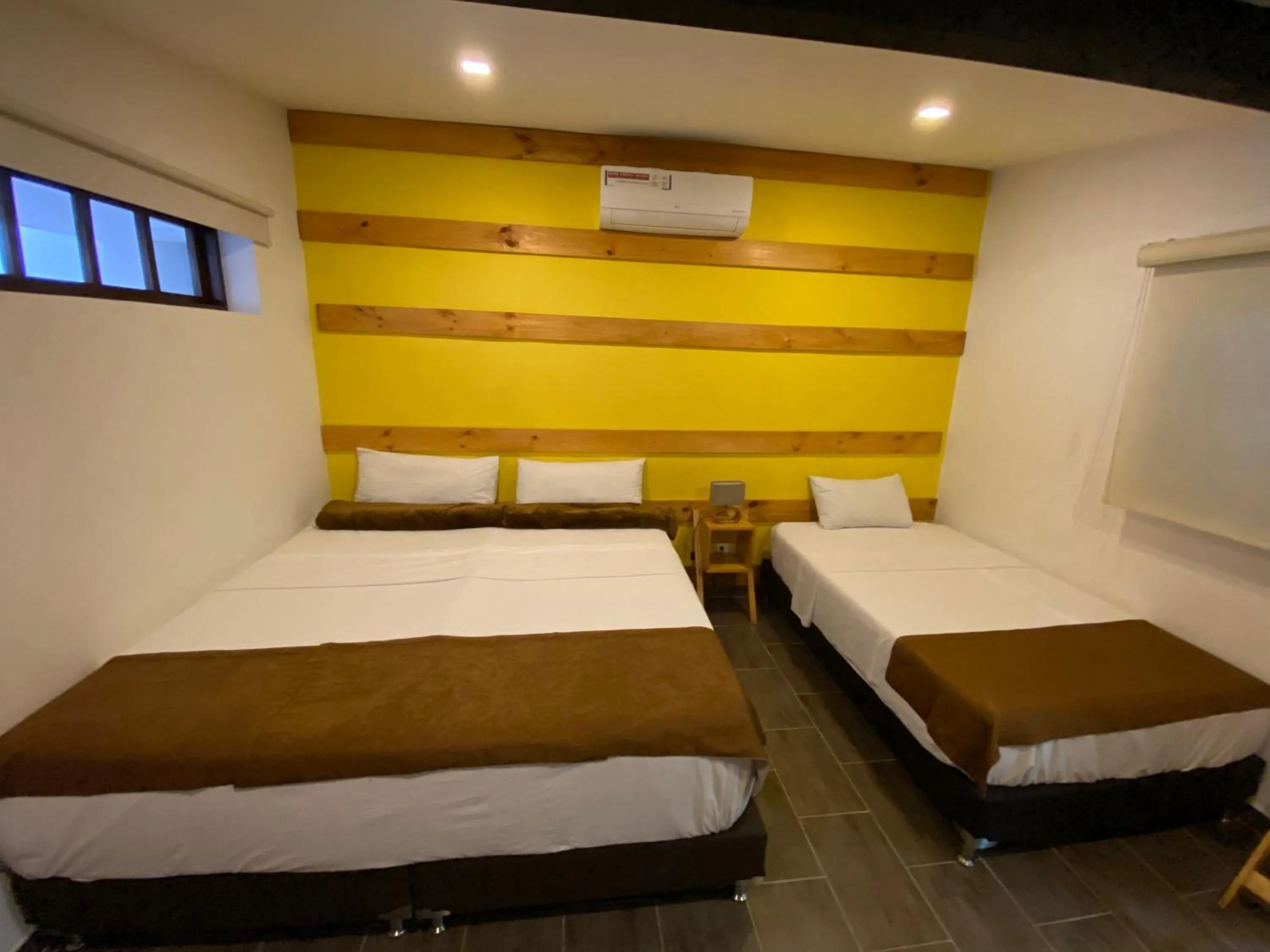 Bed in Rivière Boutique Hotel