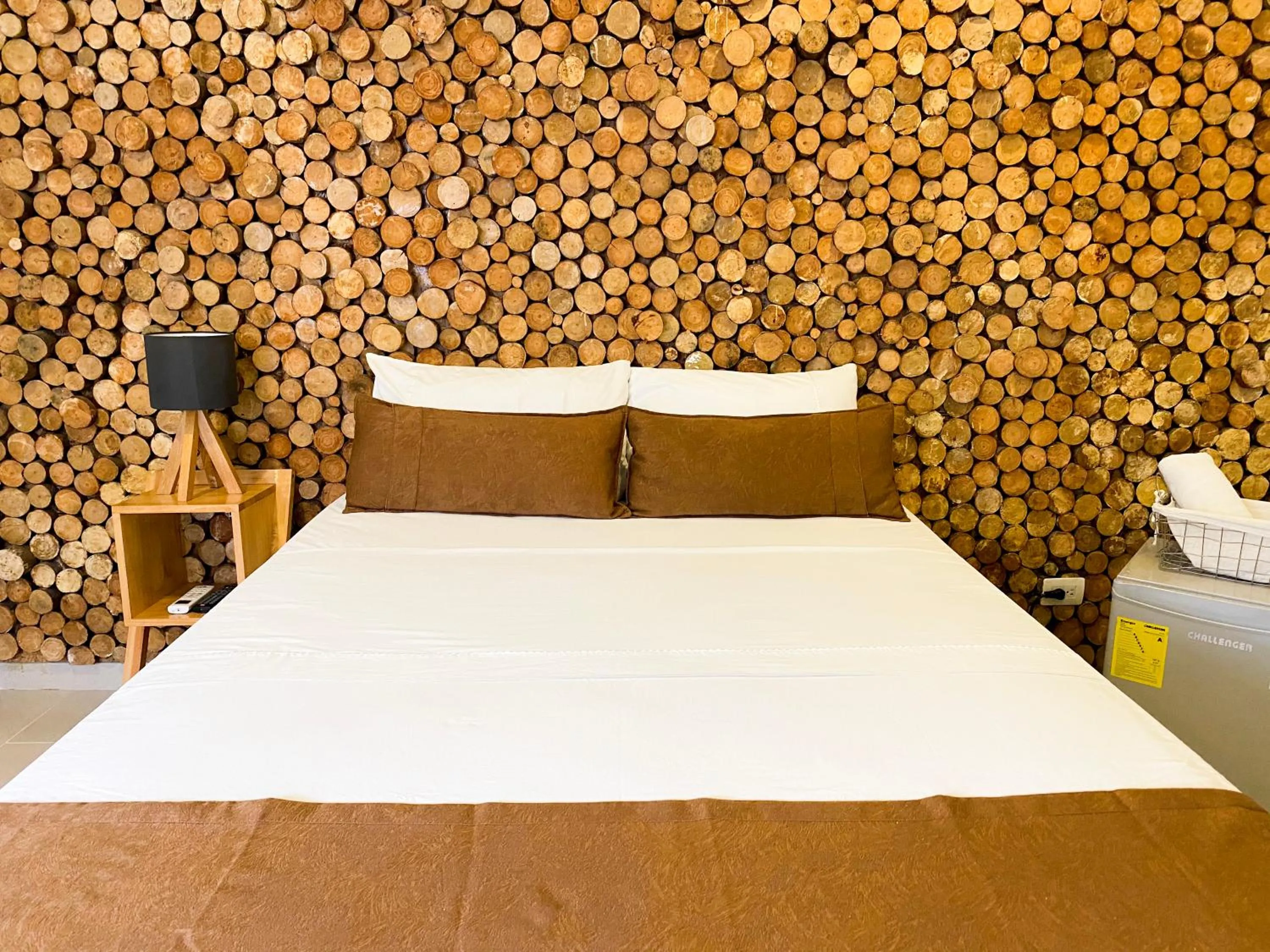 Bed in Rivière Boutique Hotel