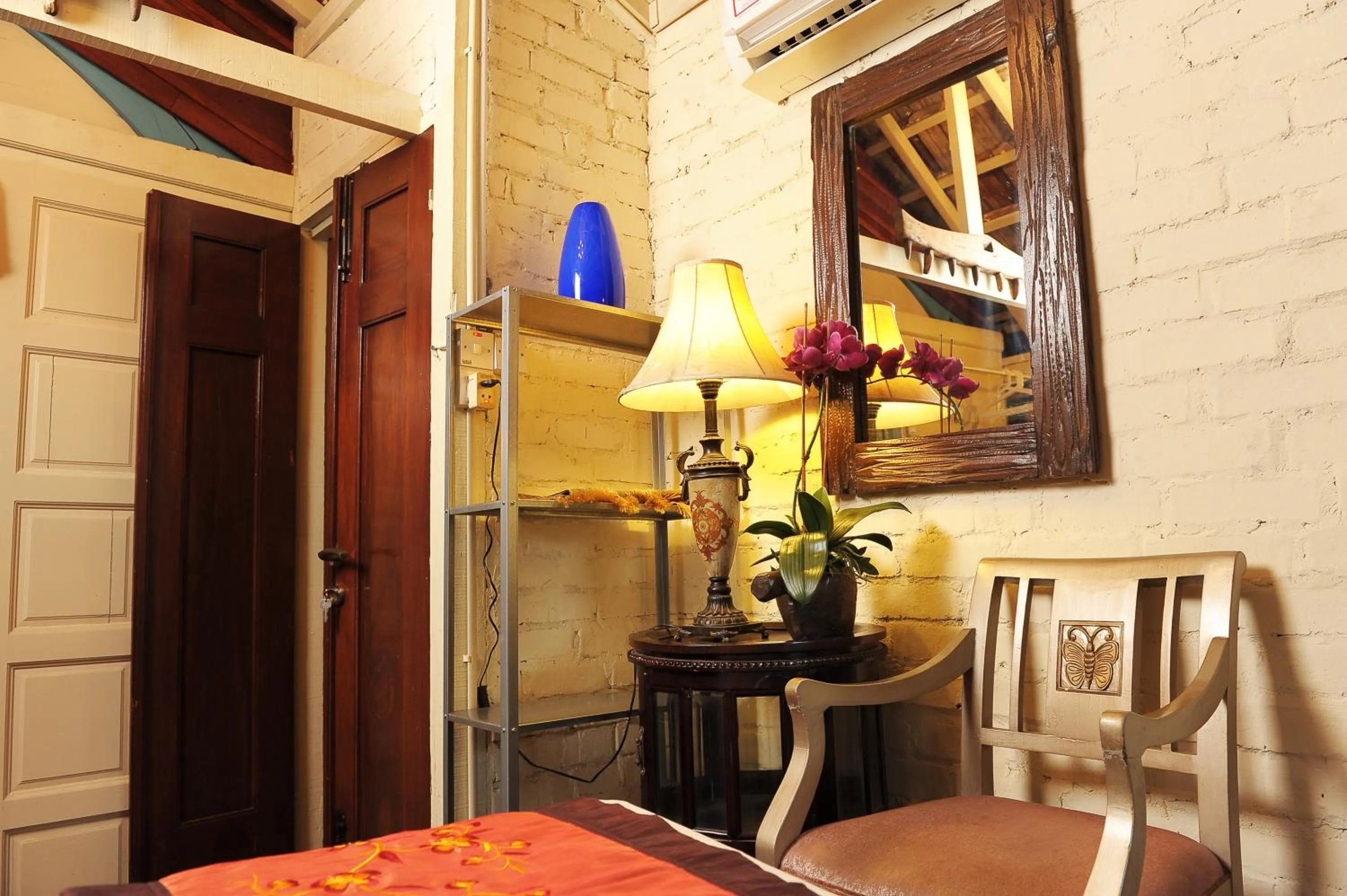 Photo of the whole room, Bed in Classic Malay House in KL City Centre