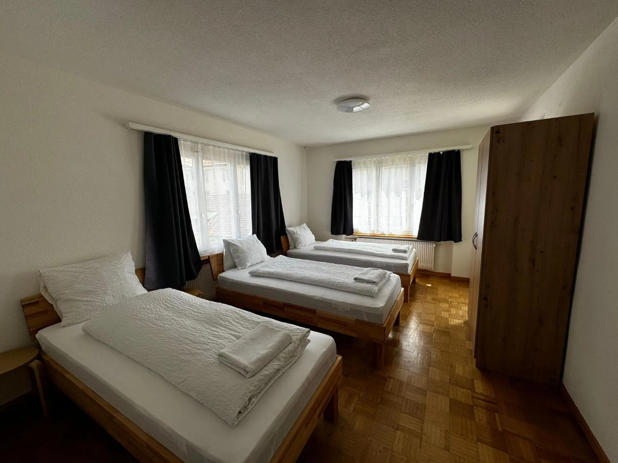 Triple Room with Shared Bathroom in Swiss Holidays-City Apartments Interlaken