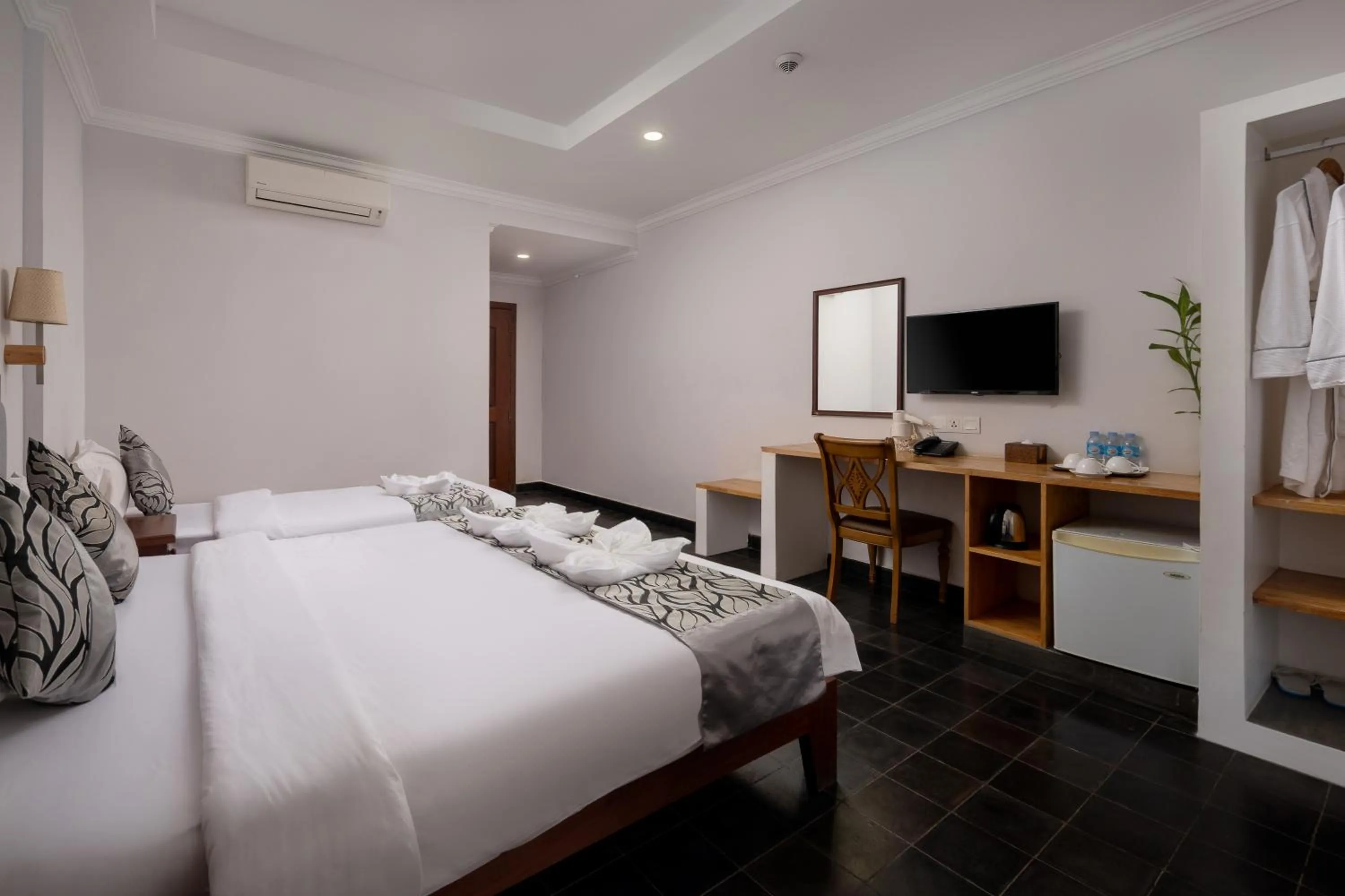 Bed in Grand Bayon Siem Reap Hotel