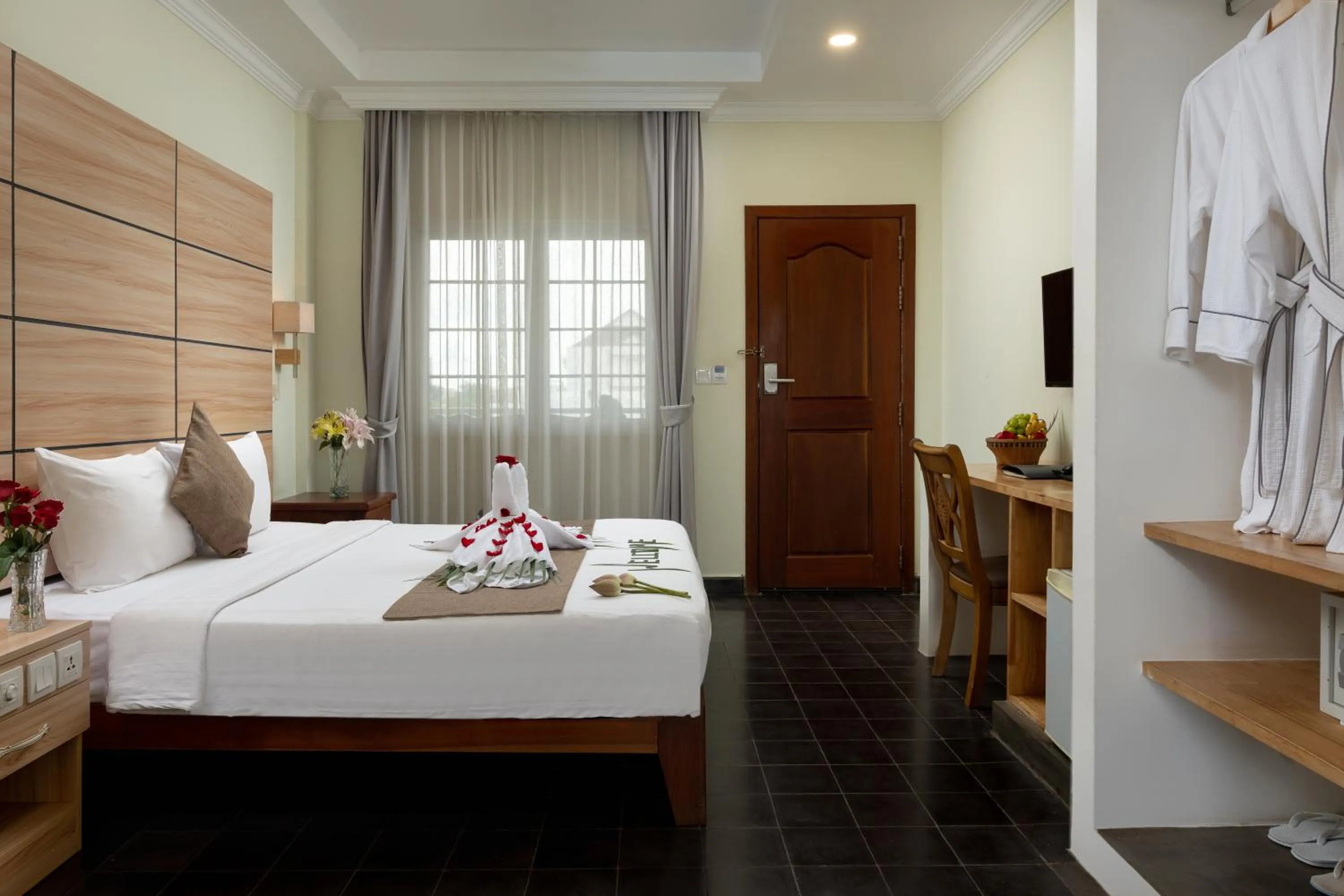 Bed in Grand Bayon Siem Reap Hotel