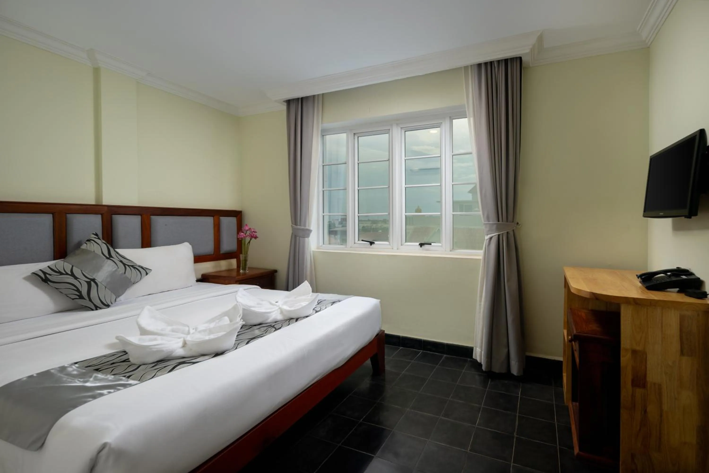 Bed in Grand Bayon Siem Reap Hotel